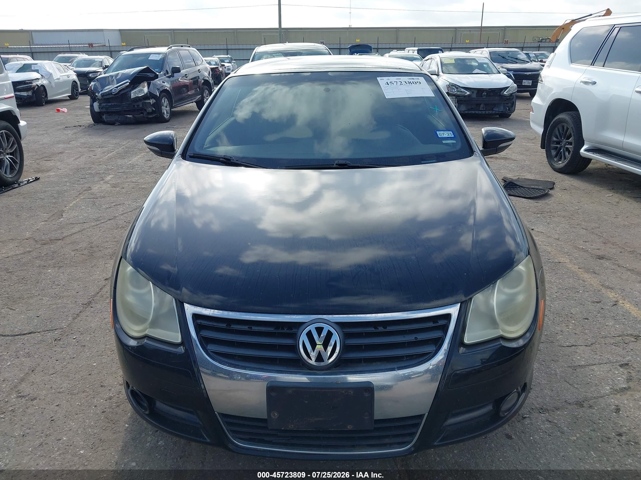 2009 Volkswagen Eos Komfort Черный vin: WVWAA71F79V021103
