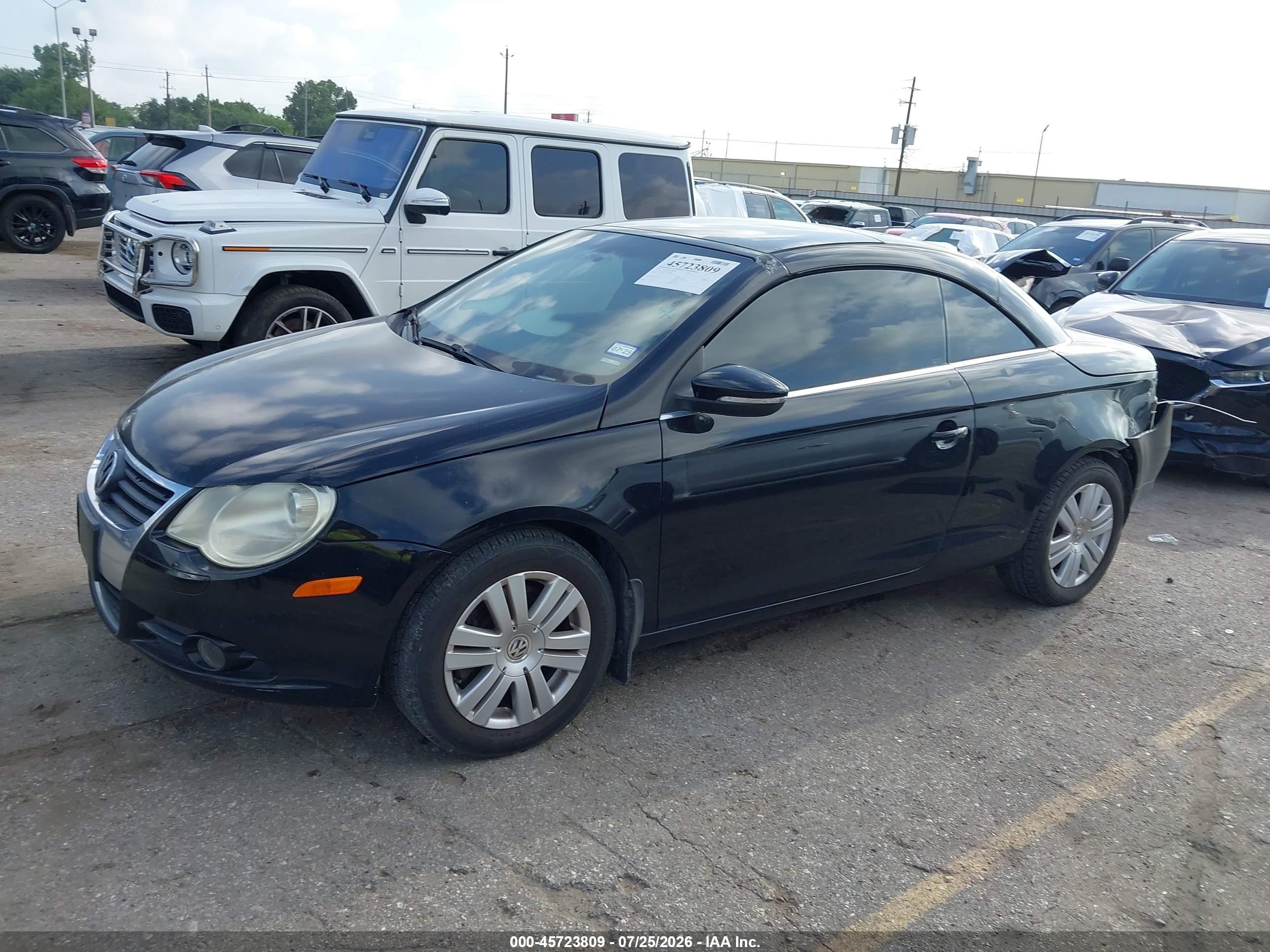 2009 Volkswagen Eos Komfort Черный vin: WVWAA71F79V021103