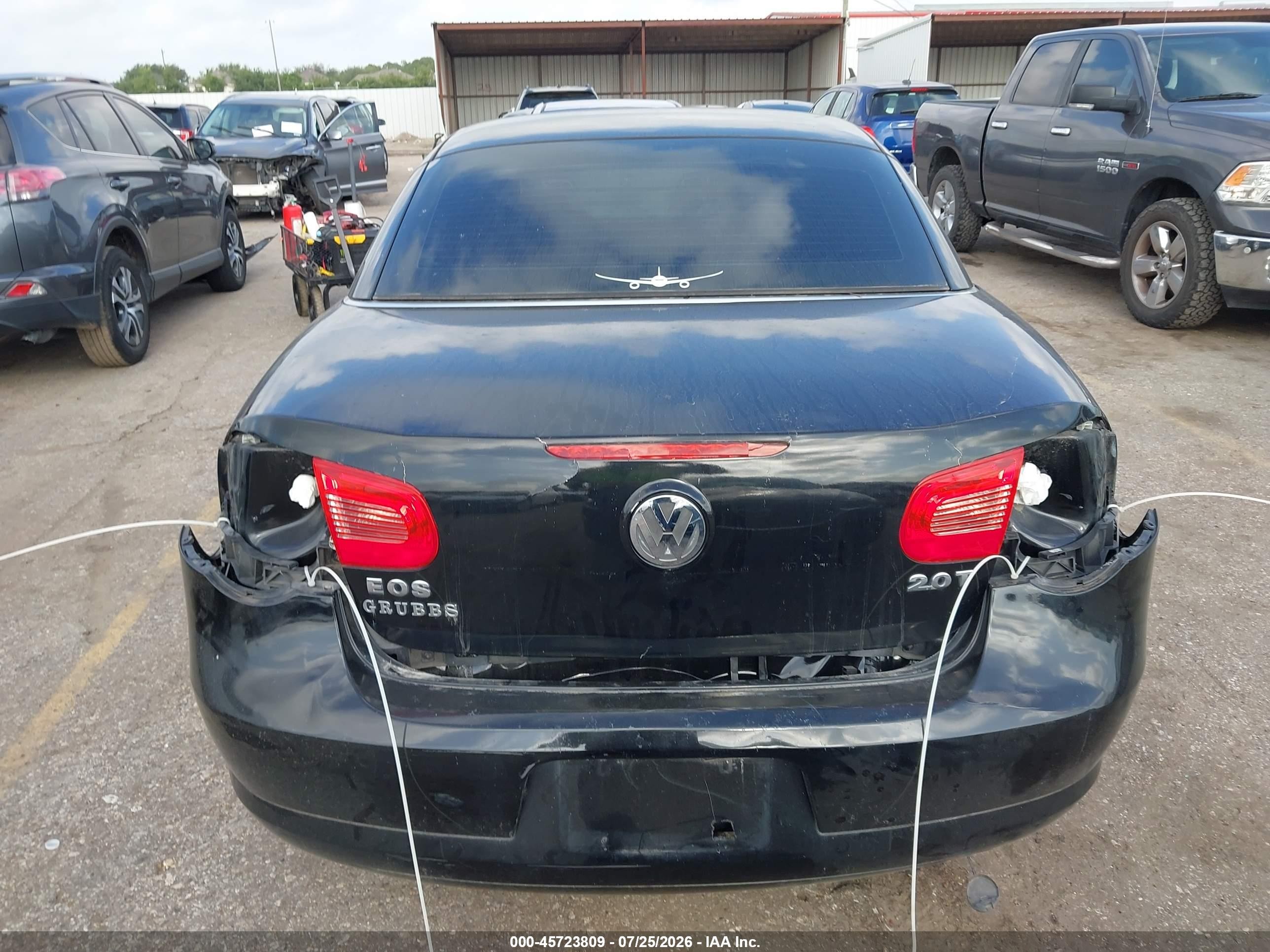 2009 Volkswagen Eos Komfort Черный vin: WVWAA71F79V021103