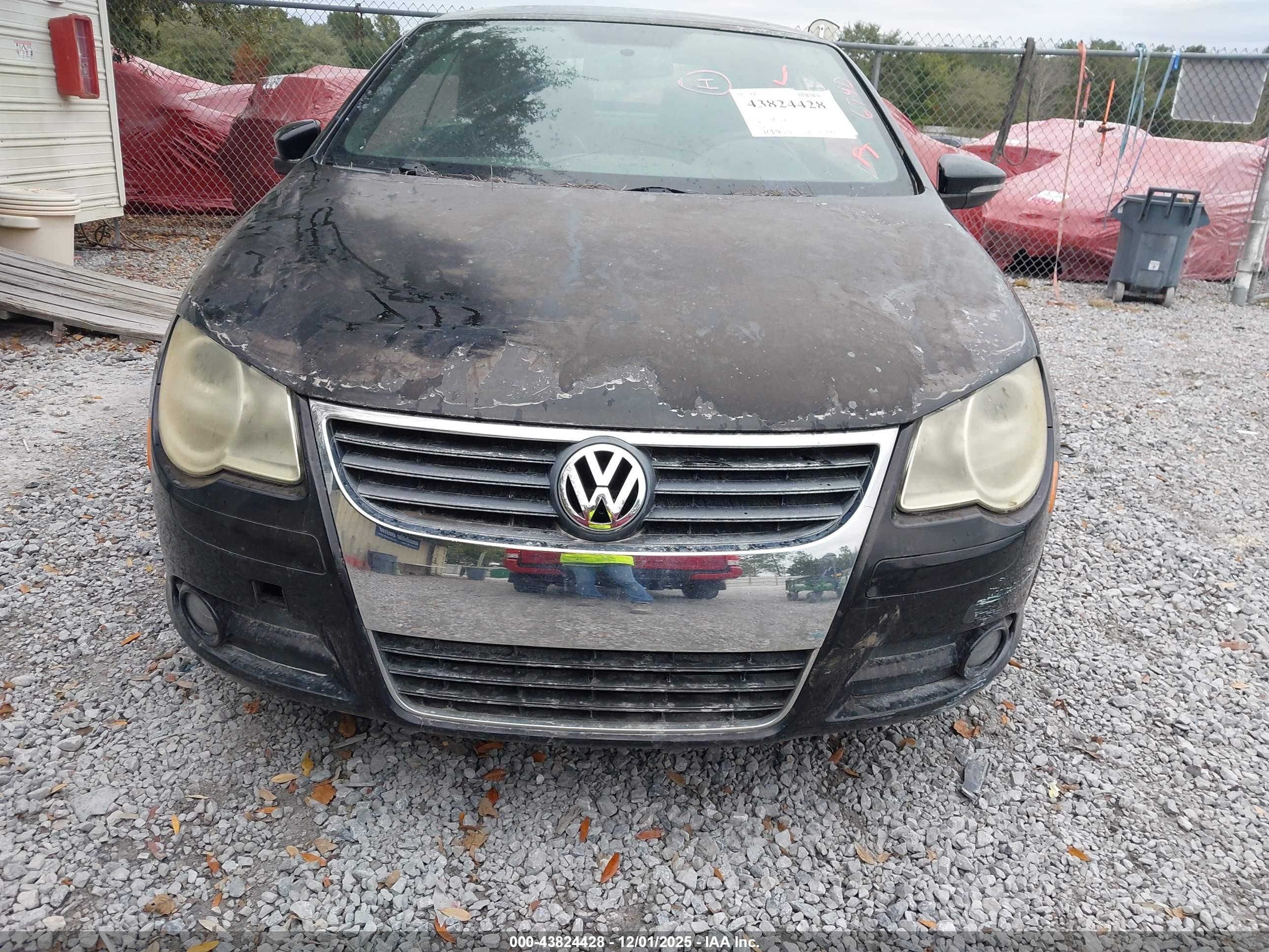 2010 Volkswagen Eos Komfort Black vin: WVWAA7AH1AV011561