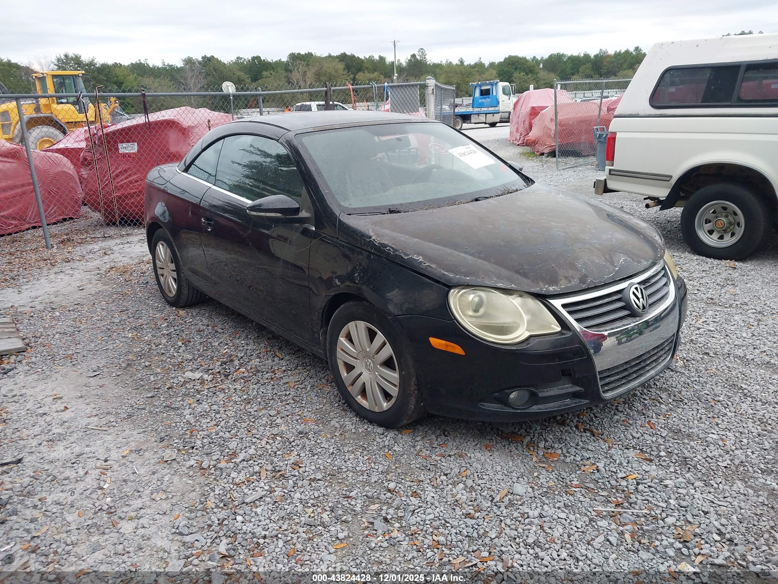 2010 Volkswagen Eos Komfort Black vin: WVWAA7AH1AV011561