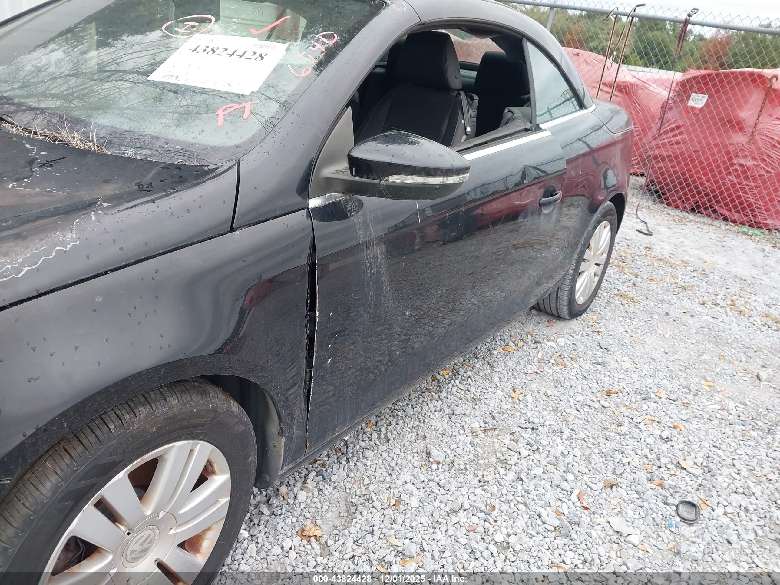 2010 Volkswagen Eos Komfort Black vin: WVWAA7AH1AV011561