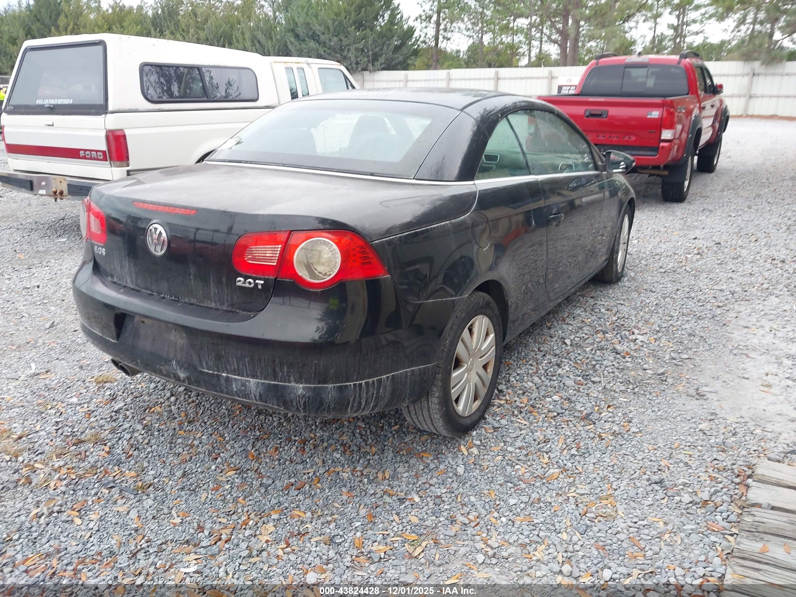 2010 Volkswagen Eos Komfort Black vin: WVWAA7AH1AV011561