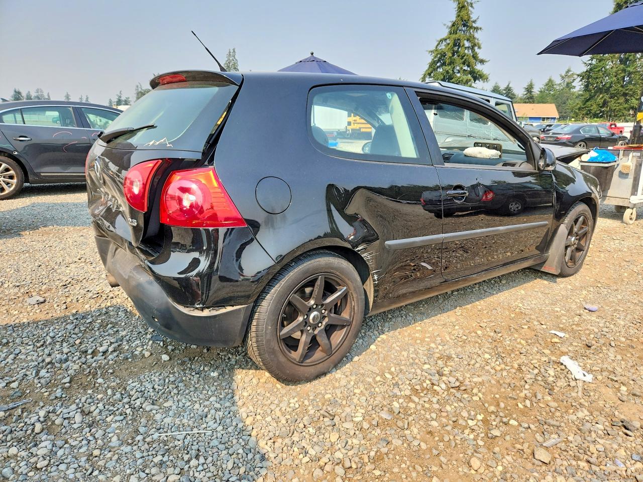 2009 Volkswagen Rabbit Black vin: WVWAB71K89W102227