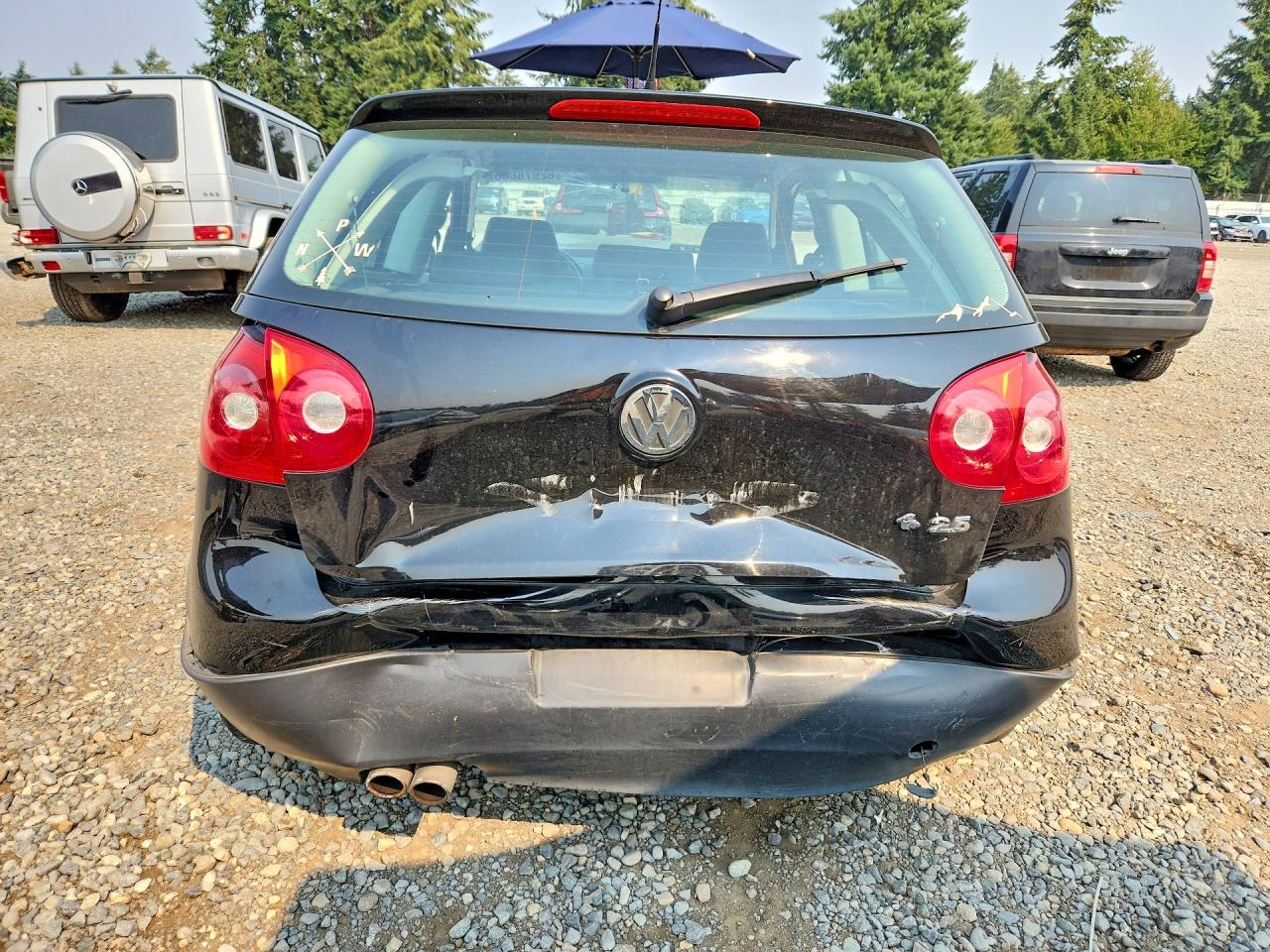 2009 Volkswagen Rabbit Black vin: WVWAB71K89W102227