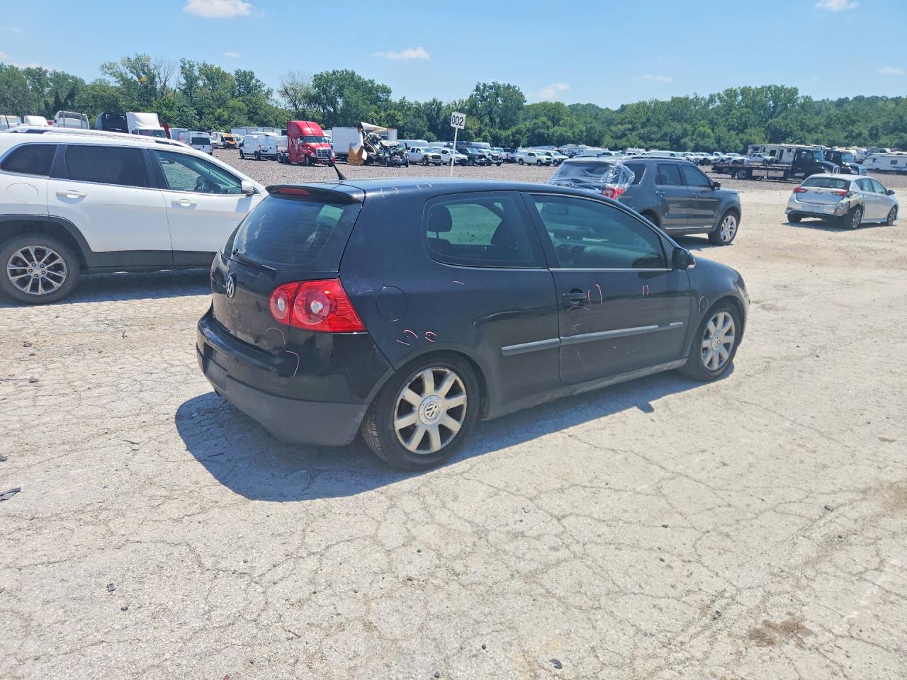2009 Volkswagen Rabbit Black vin: WVWAB71KX9W135682