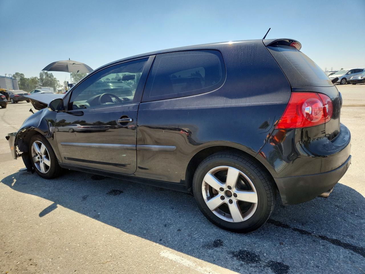 2009 Volkswagen Rabbit Black vin: WVWAB71KX9W141899