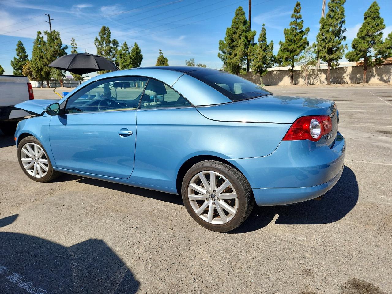 2009 Volkswagen Eos Turbo Blue vin: WVWBA71F09V004440