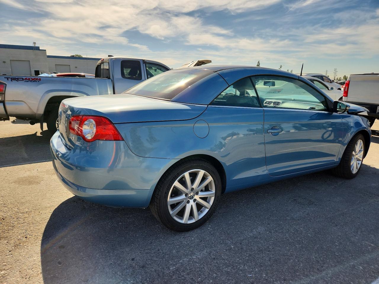 2009 Volkswagen Eos Turbo Blue vin: WVWBA71F09V004440