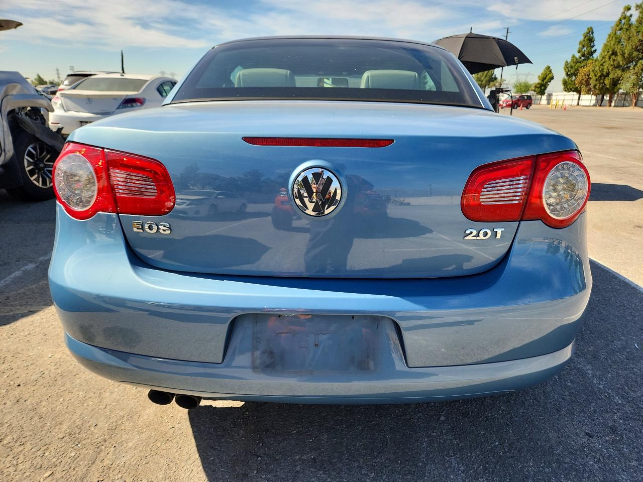 2009 Volkswagen Eos Turbo Blue vin: WVWBA71F09V004440