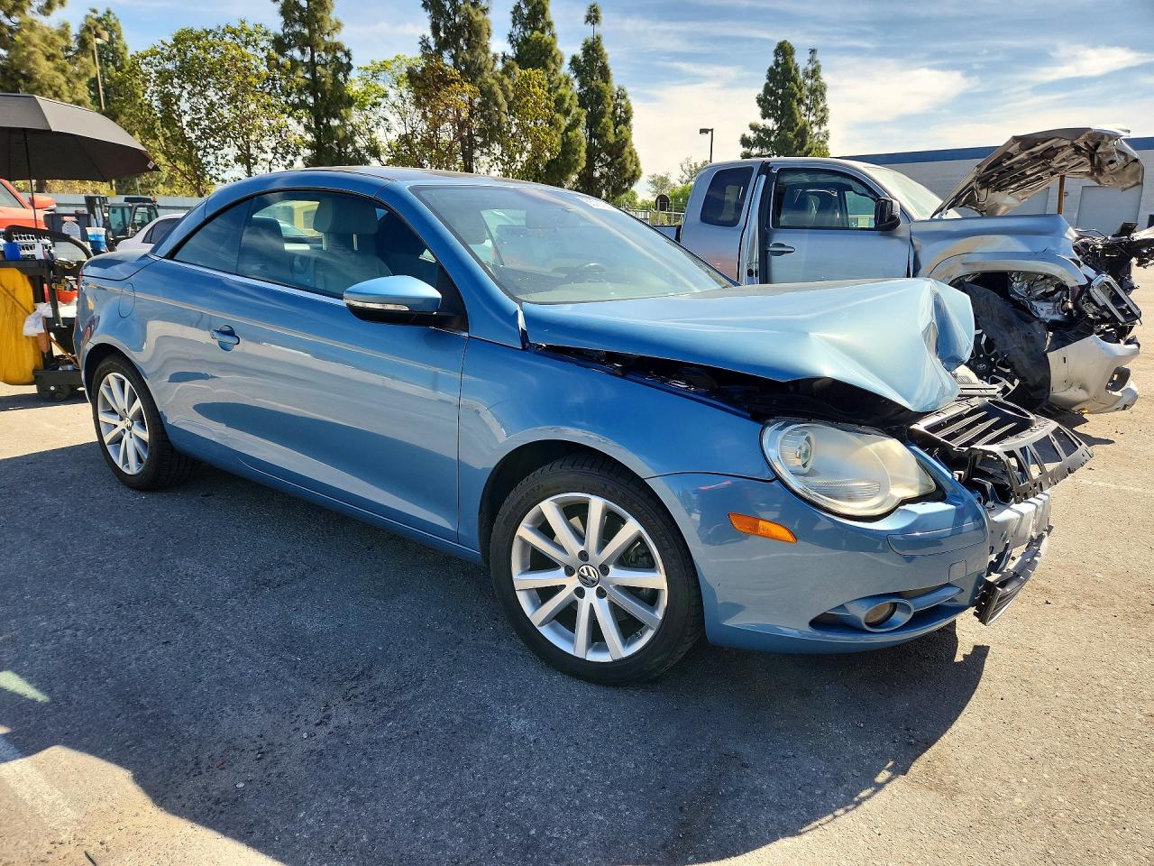 2009 Volkswagen Eos Turbo Blue vin: WVWBA71F09V004440
