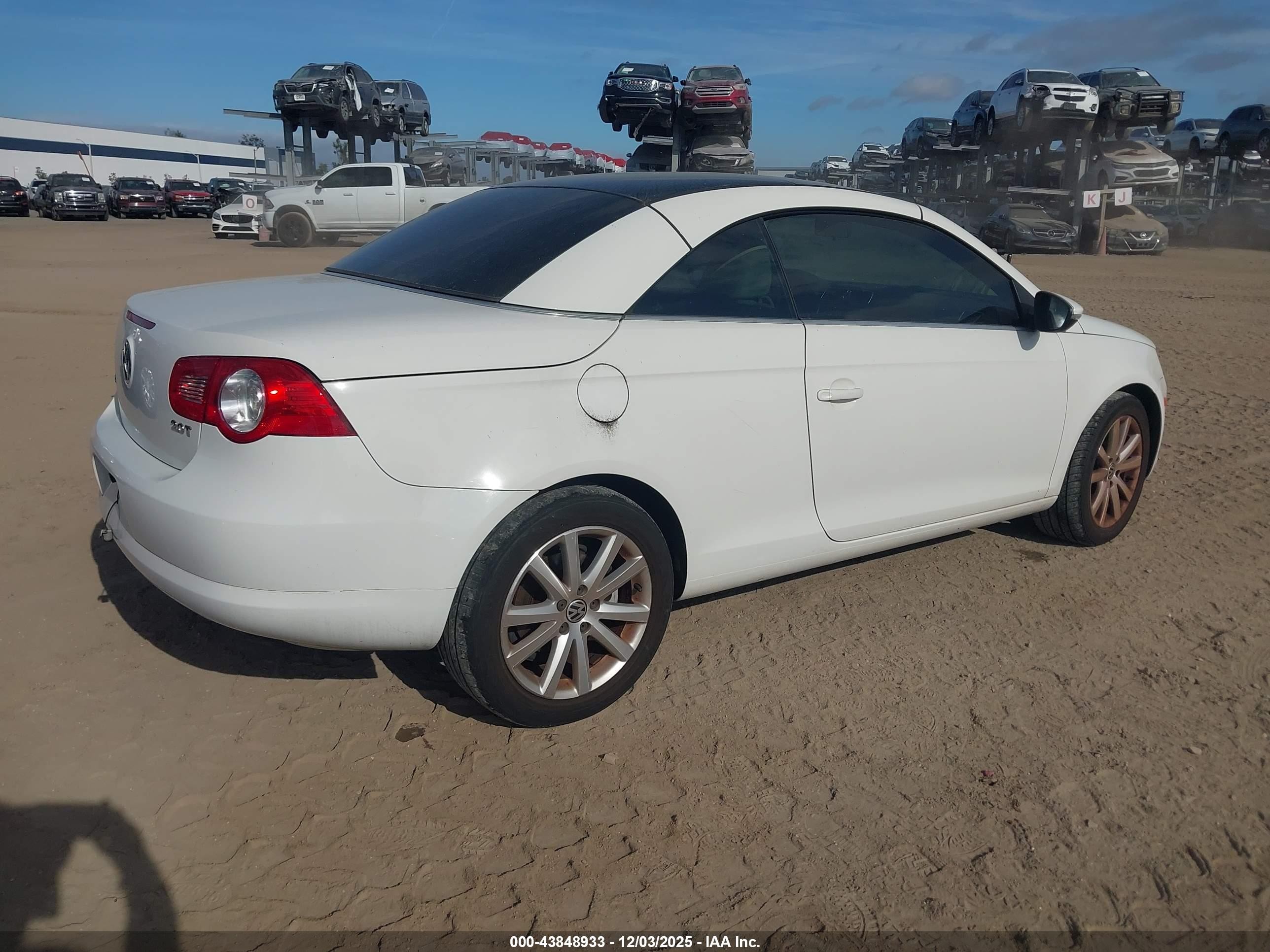 2009 Volkswagen Eos Komfort White vin: WVWBA71F19V015379