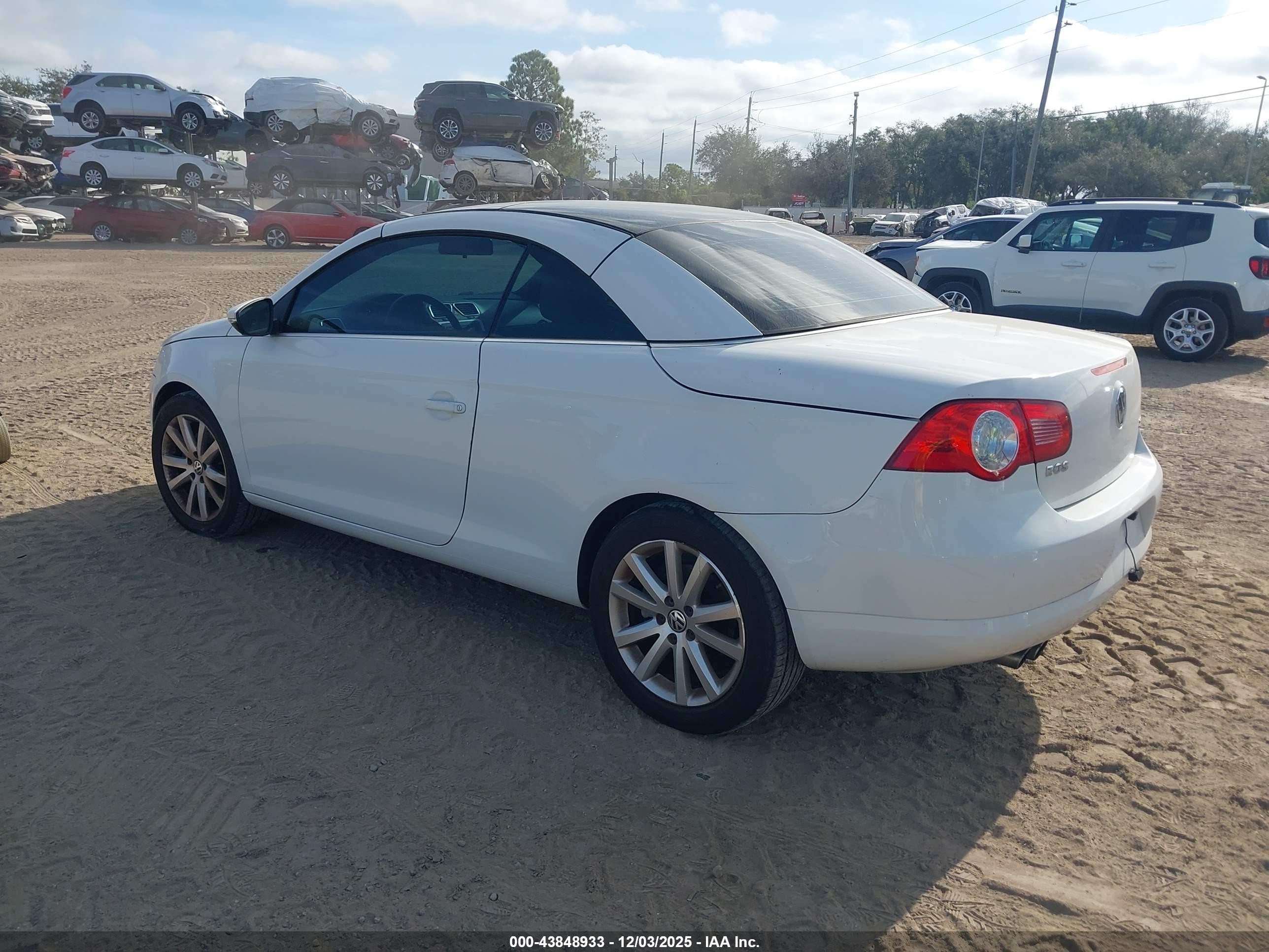 2009 Volkswagen Eos Komfort White vin: WVWBA71F19V015379