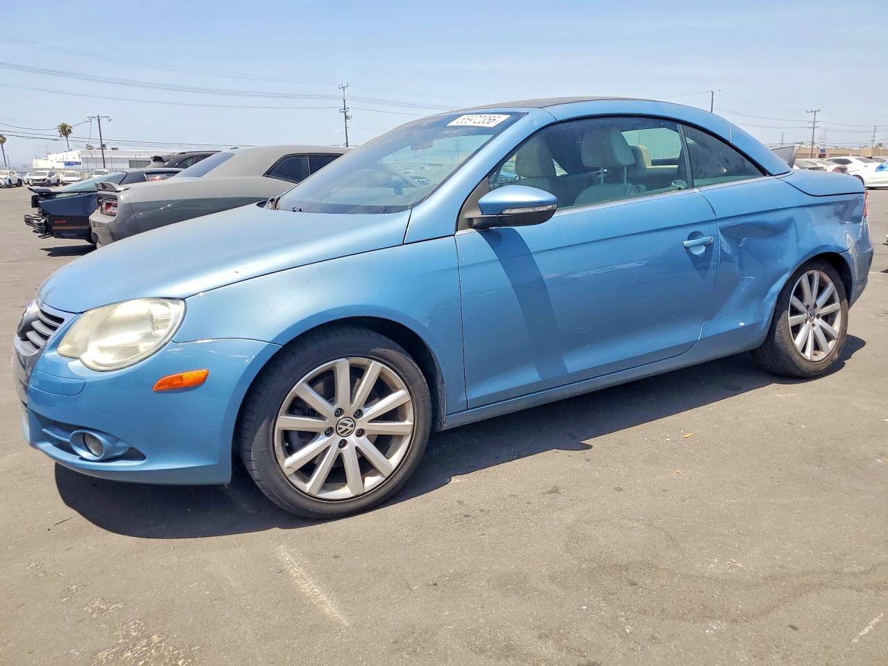 2009 Volkswagen Eos Turbo Blue vin: WVWBA71F39V006019
