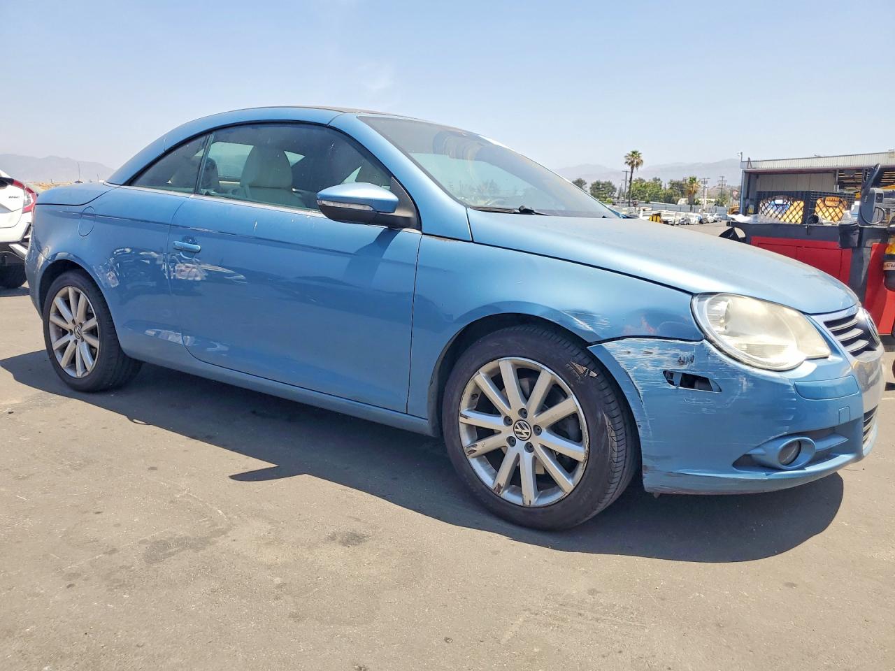 2009 Volkswagen Eos Turbo Blue vin: WVWBA71F39V006019