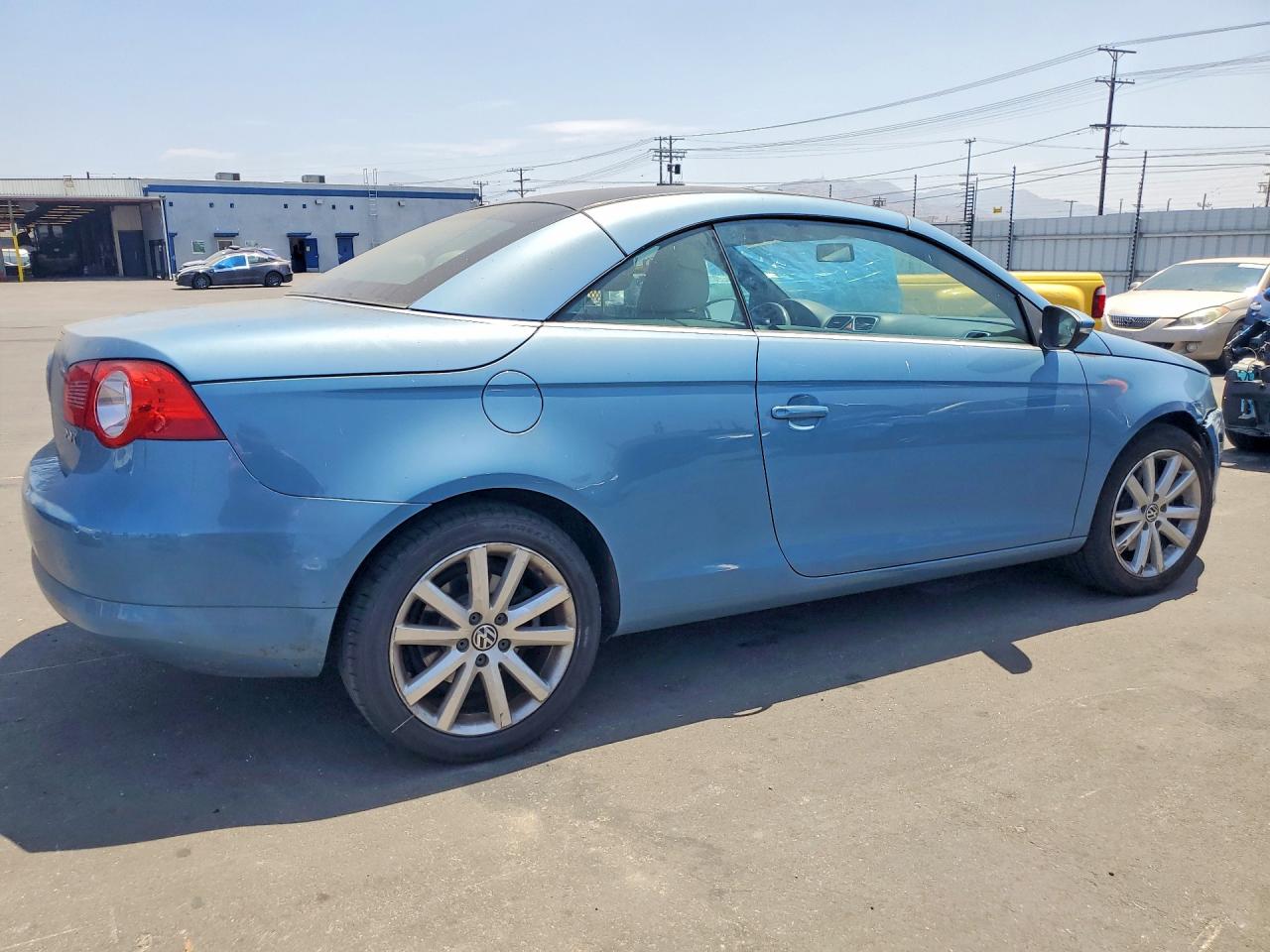 2009 Volkswagen Eos Turbo Blue vin: WVWBA71F39V006019