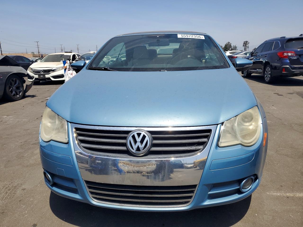 2009 Volkswagen Eos Turbo Blue vin: WVWBA71F39V006019