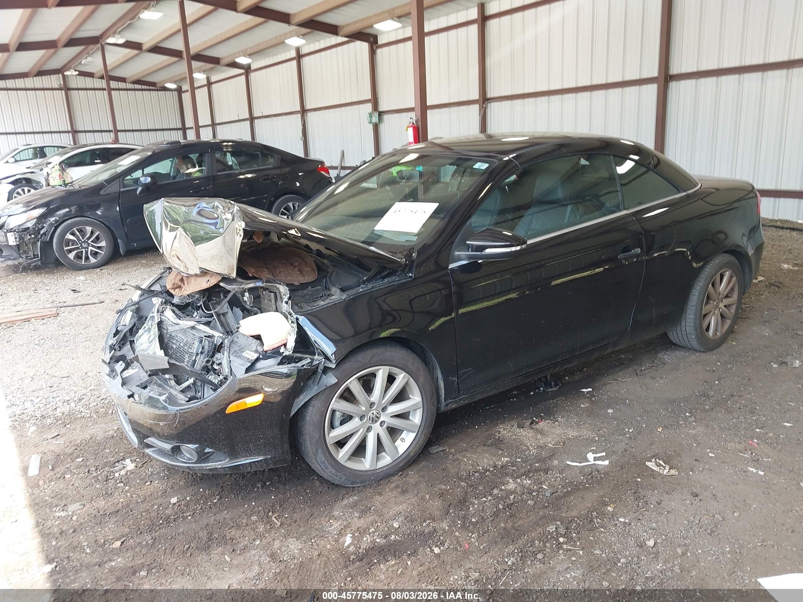 2009 Volkswagen Eos Komfort Black vin: WVWBA71F49V018129