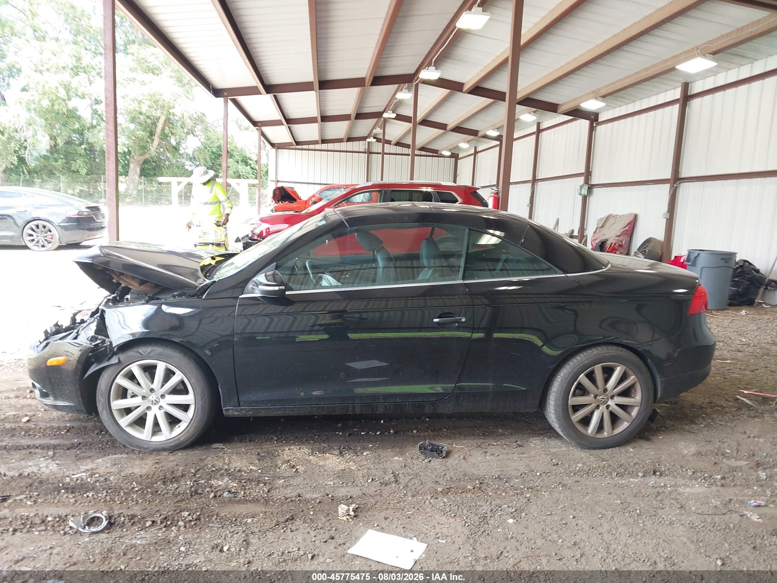2009 Volkswagen Eos Komfort Black vin: WVWBA71F49V018129