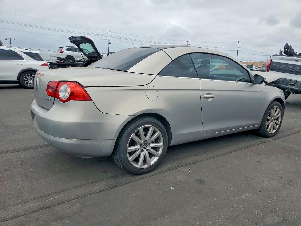 2009 Volkswagen Eos Turbo Tan vin: WVWBA71F69V008122