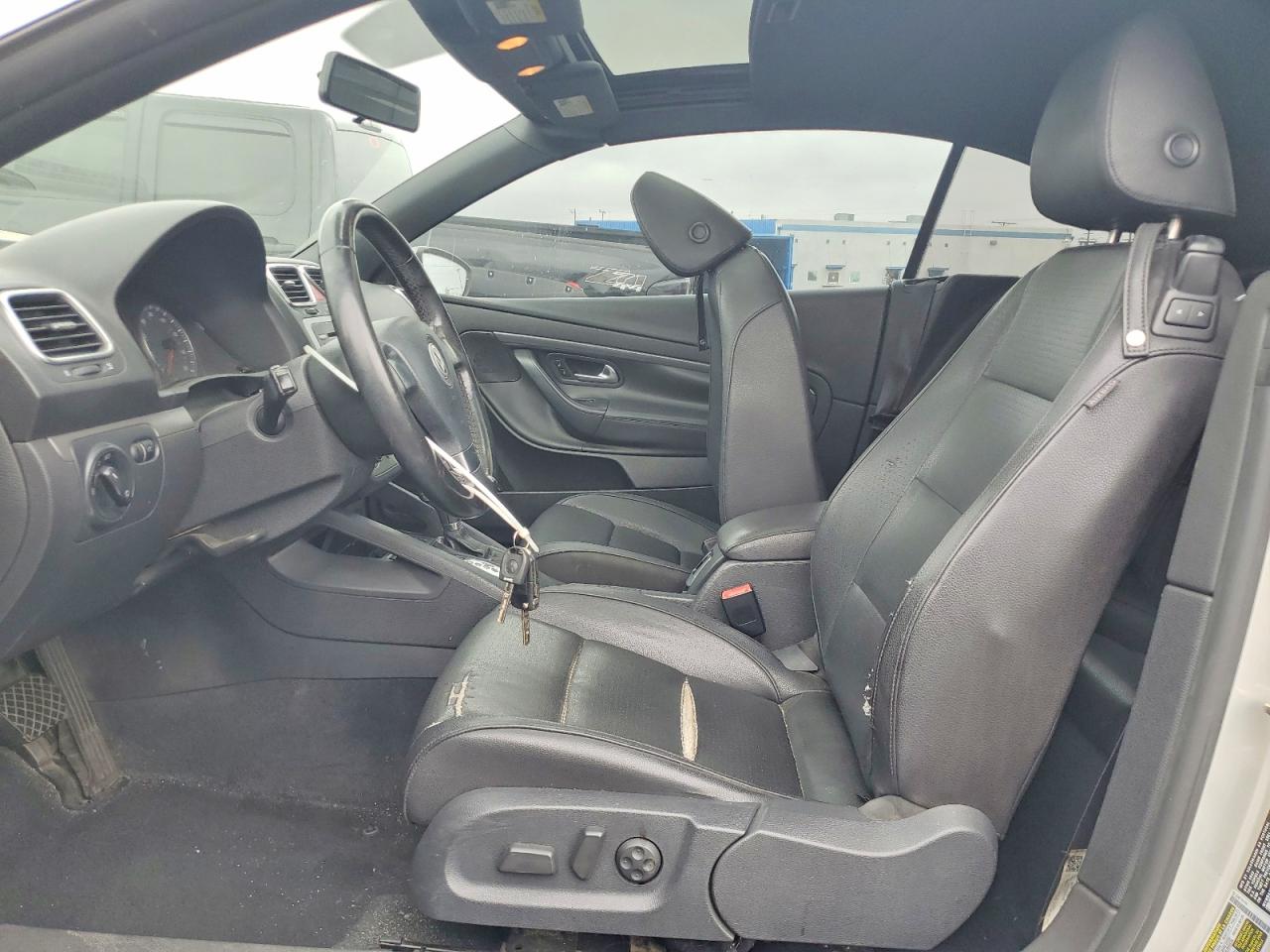 2009 Volkswagen Eos Turbo Tan vin: WVWBA71F69V008122