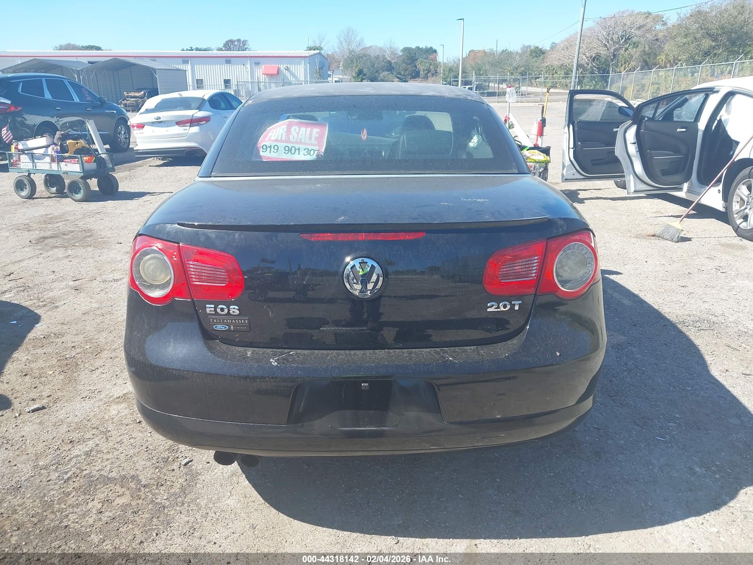 2009 Volkswagen Eos Komfort Черный vin: WVWBA71F89V013354