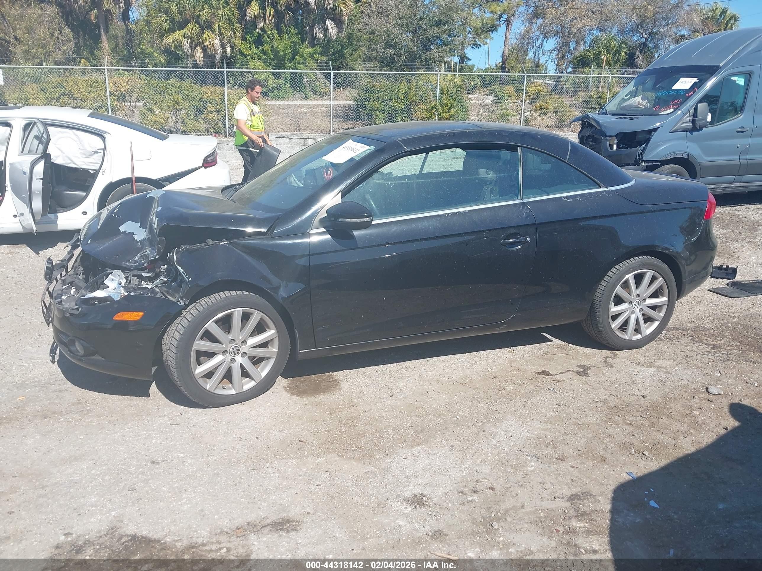 2009 Volkswagen Eos Komfort Черный vin: WVWBA71F89V013354