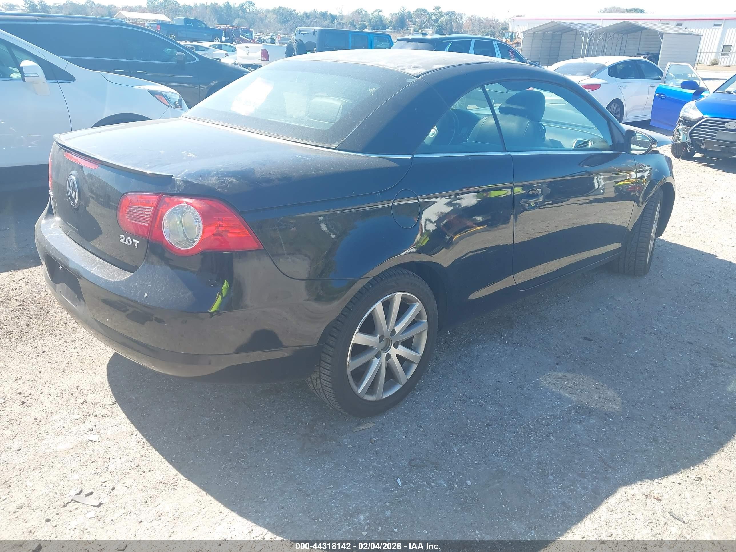2009 Volkswagen Eos Komfort Черный vin: WVWBA71F89V013354