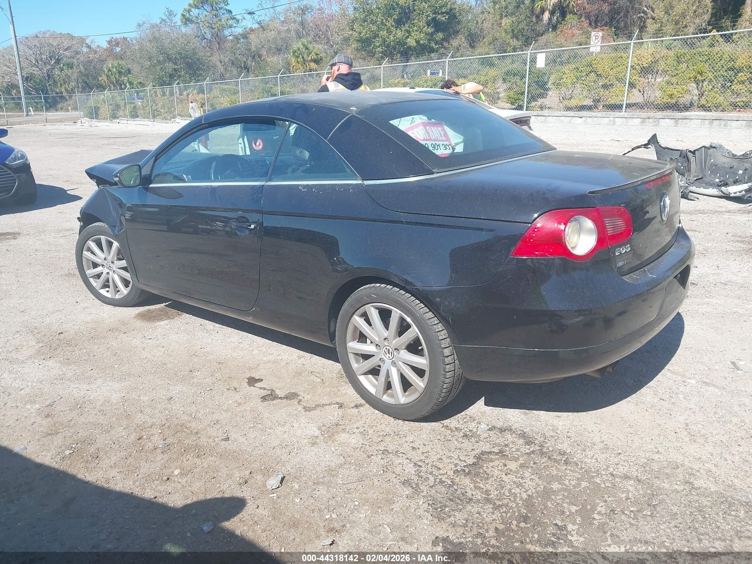 2009 Volkswagen Eos Komfort Черный vin: WVWBA71F89V013354