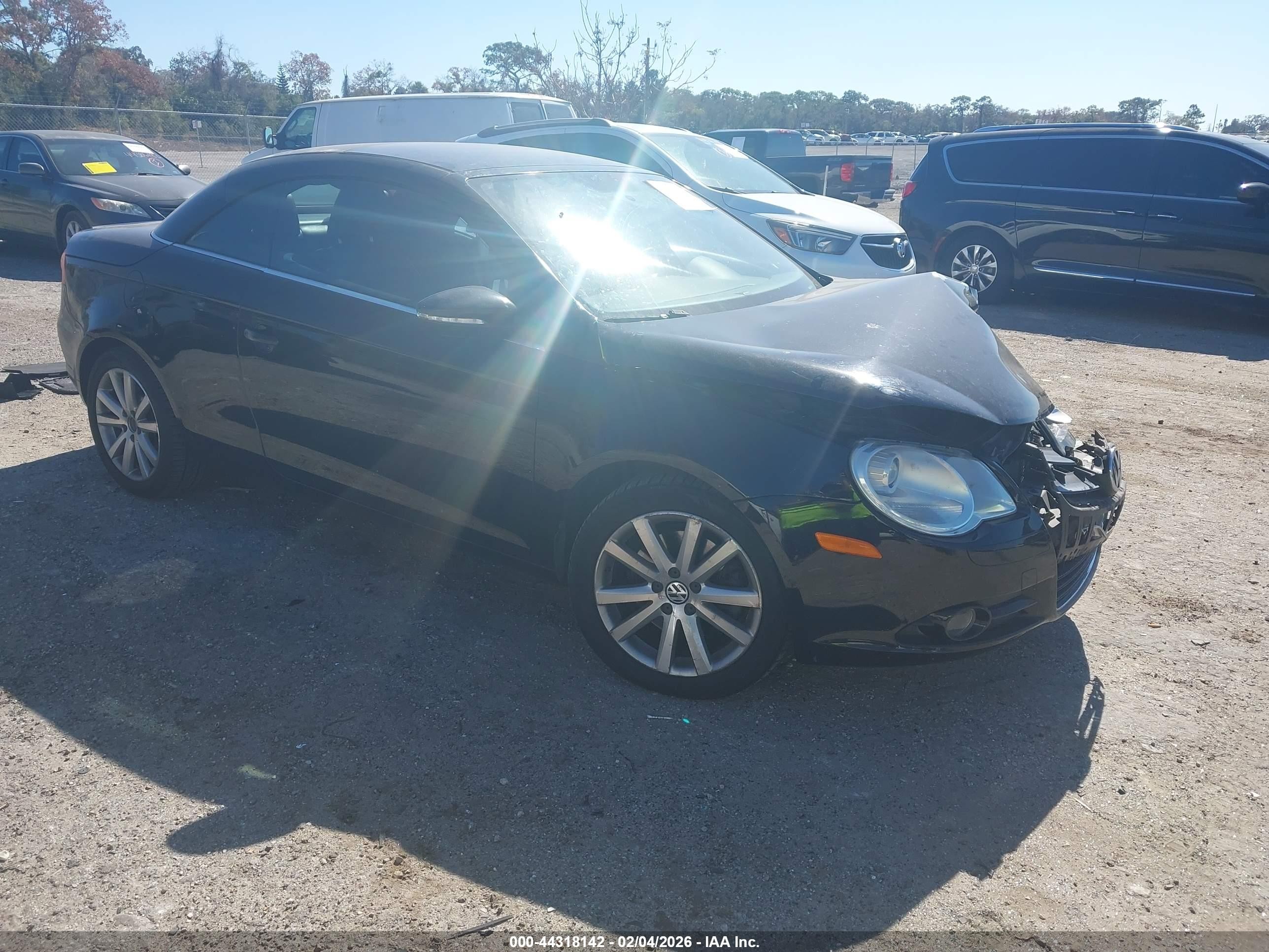 2009 Volkswagen Eos Komfort Black vin: WVWBA71F89V013354