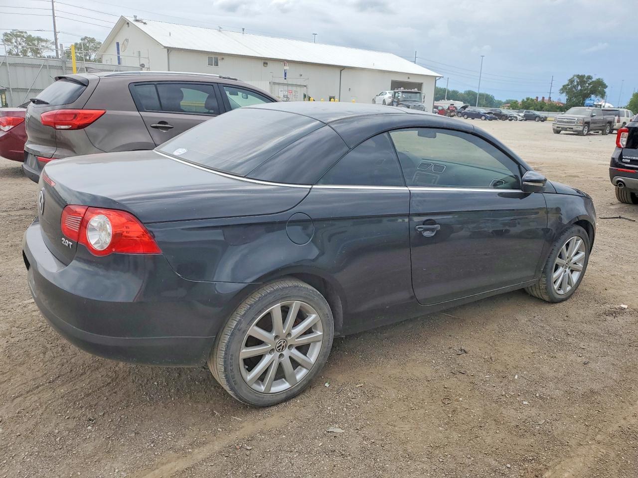 2009 Volkswagen Eos Turbo Black vin: WVWBA71F99V014075