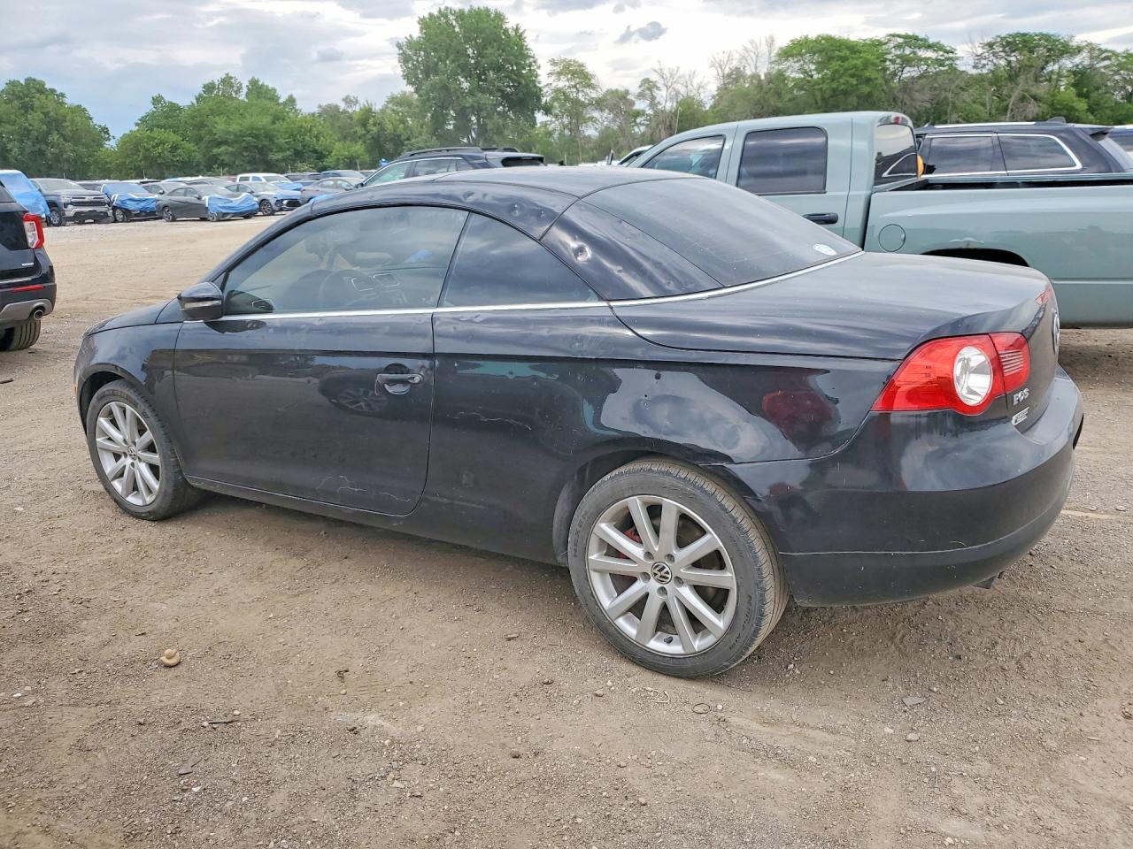 2009 Volkswagen Eos Turbo Black vin: WVWBA71F99V014075