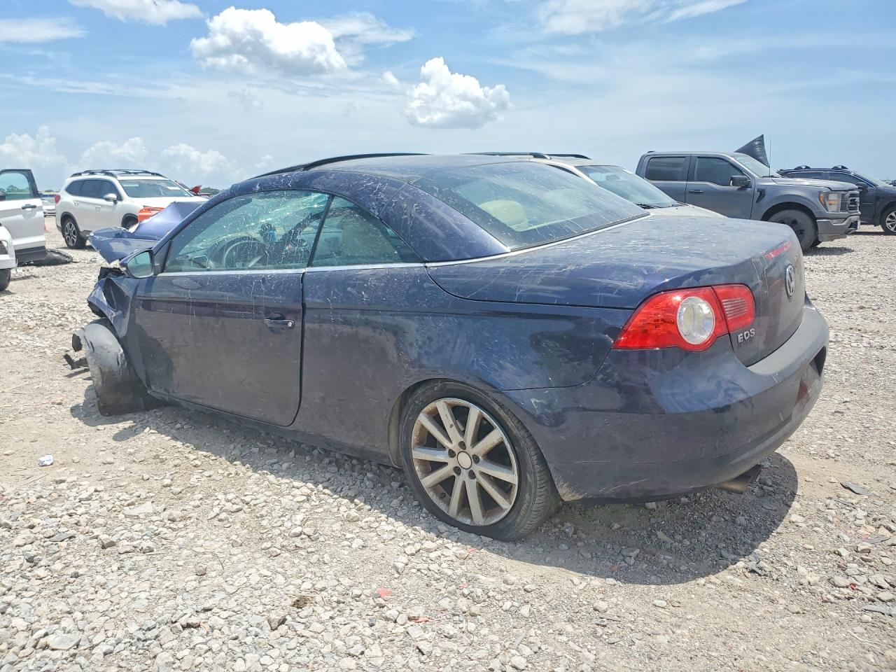 2009 Volkswagen Eos Turbo Black vin: WVWBA71FX9V021536