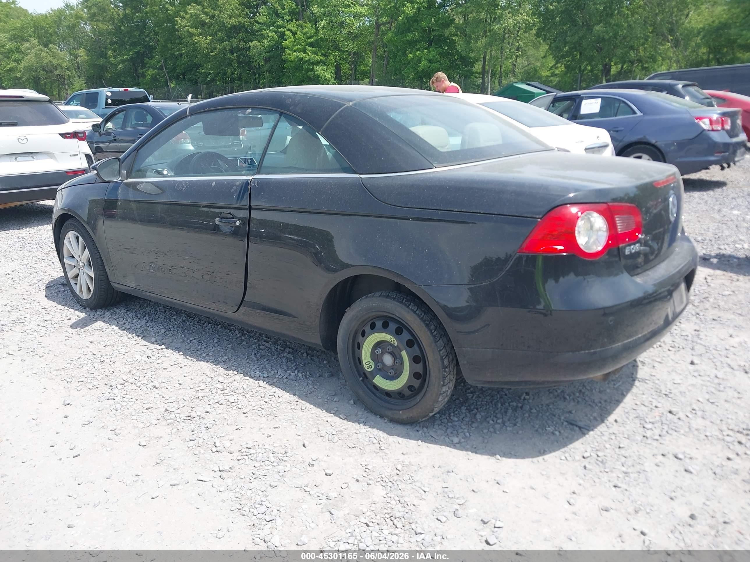 2010 Volkswagen Eos Komfort Black vin: WVWBA7AH2AV011427