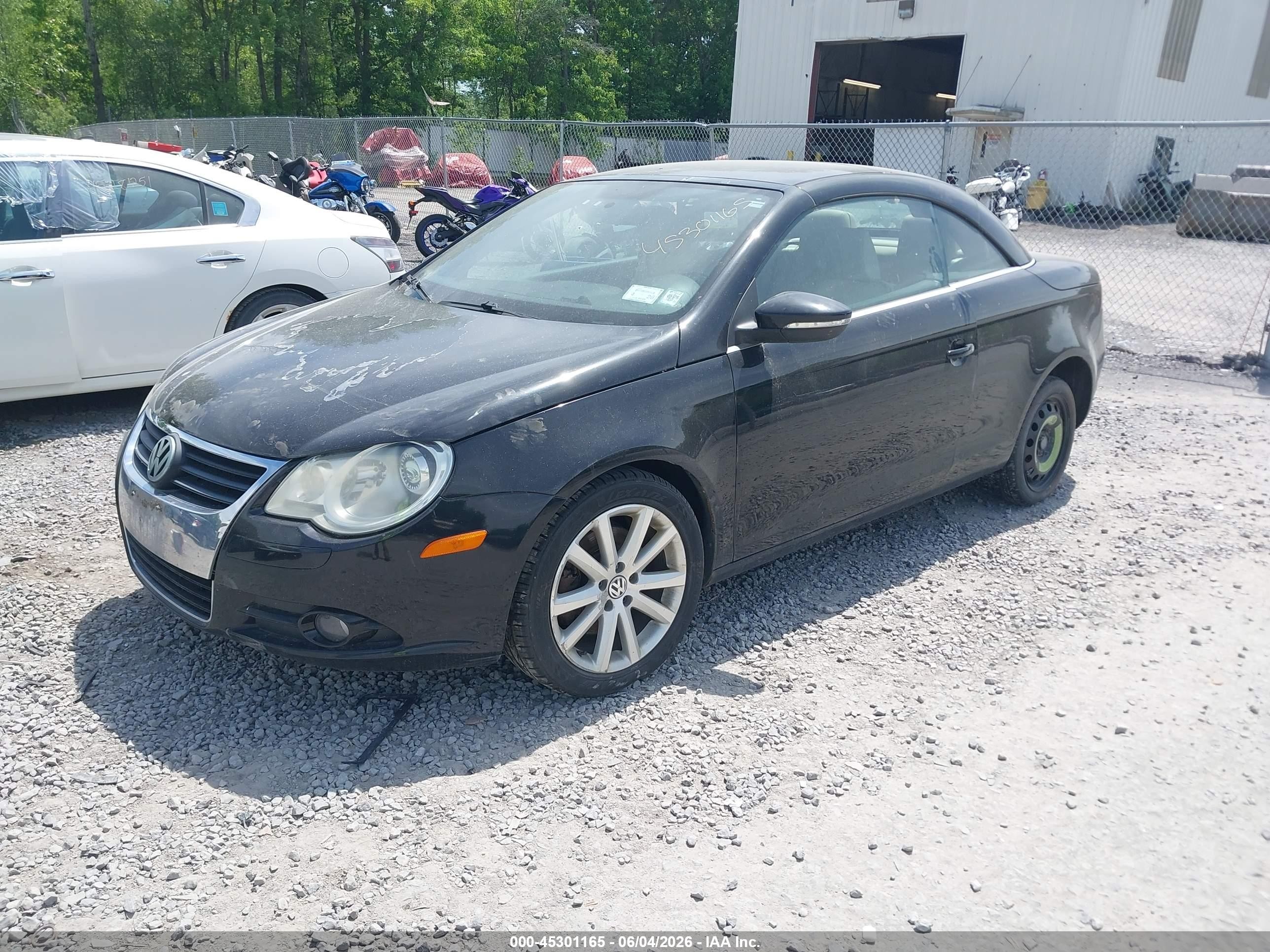 2010 Volkswagen Eos Komfort Black vin: WVWBA7AH2AV011427