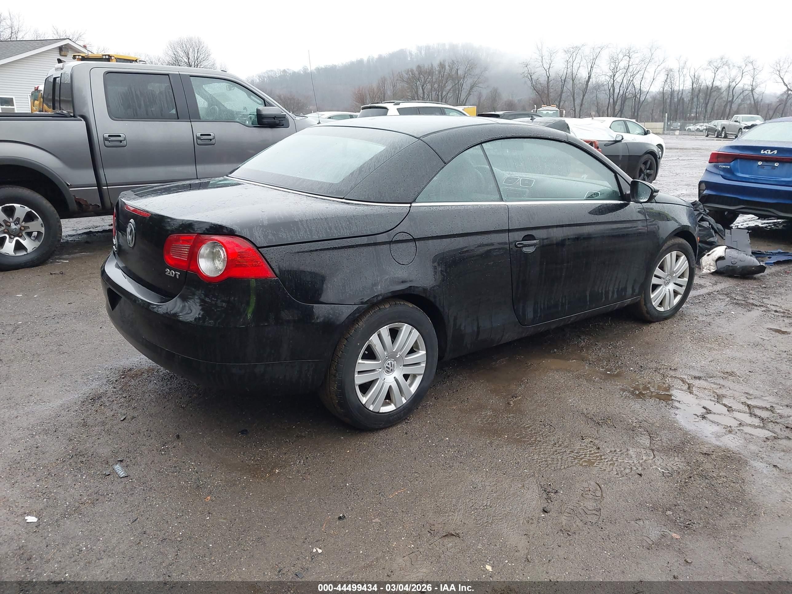 2010 Volkswagen Eos Komfort Black vin: WVWBA7AH2AV020631