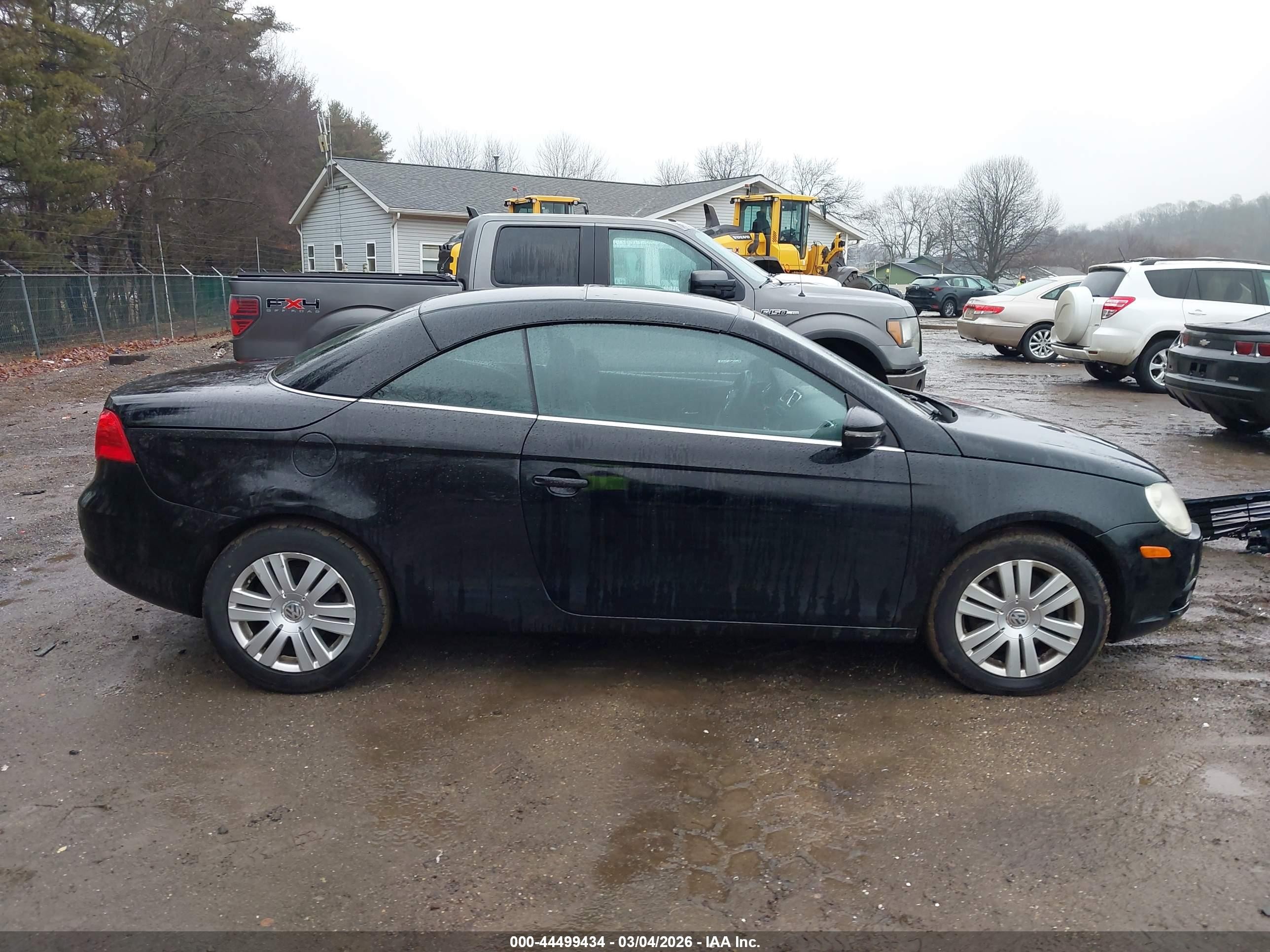 2010 Volkswagen Eos Komfort Black vin: WVWBA7AH2AV020631