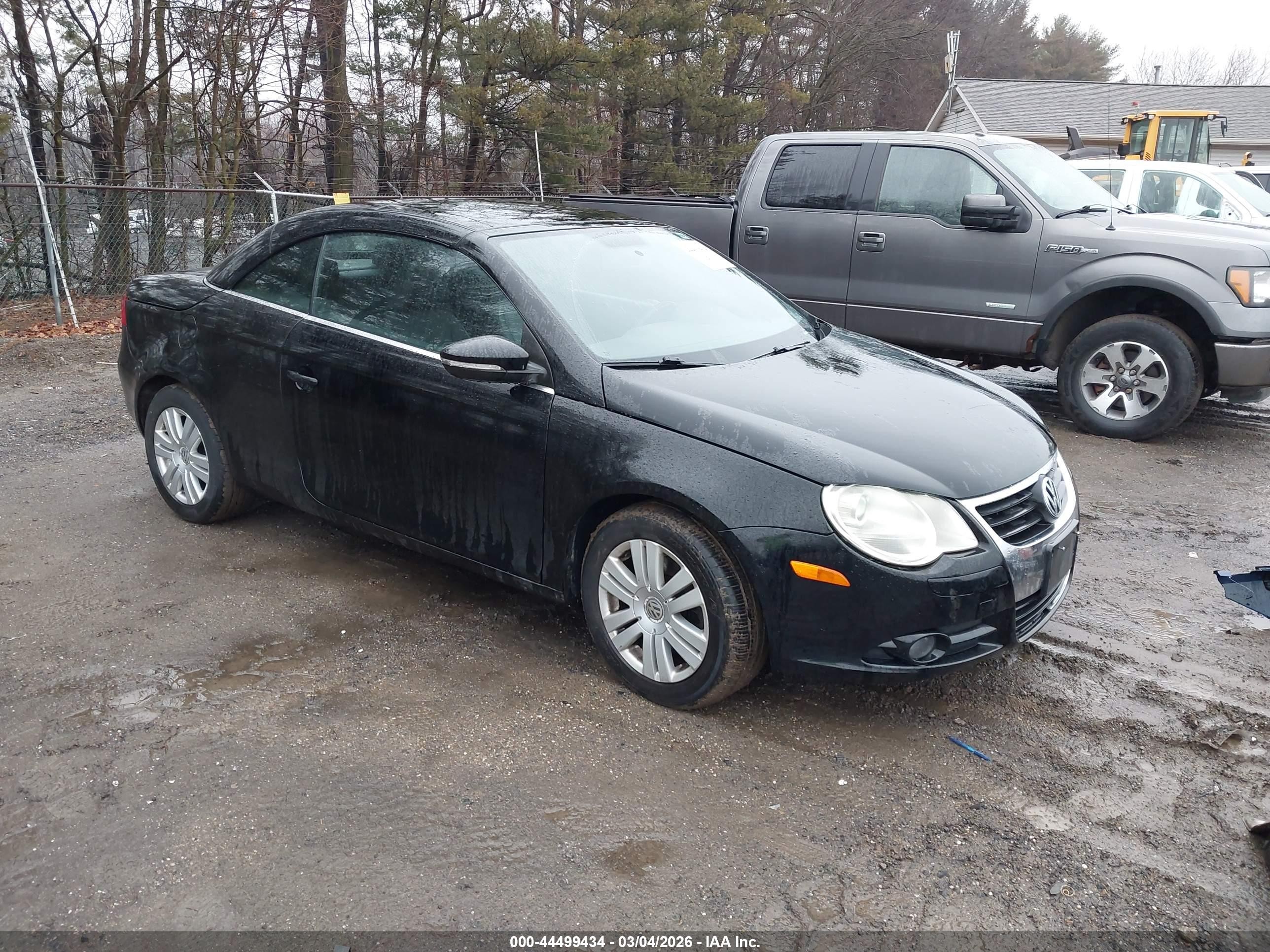 2010 Volkswagen Eos Komfort Black vin: WVWBA7AH2AV020631