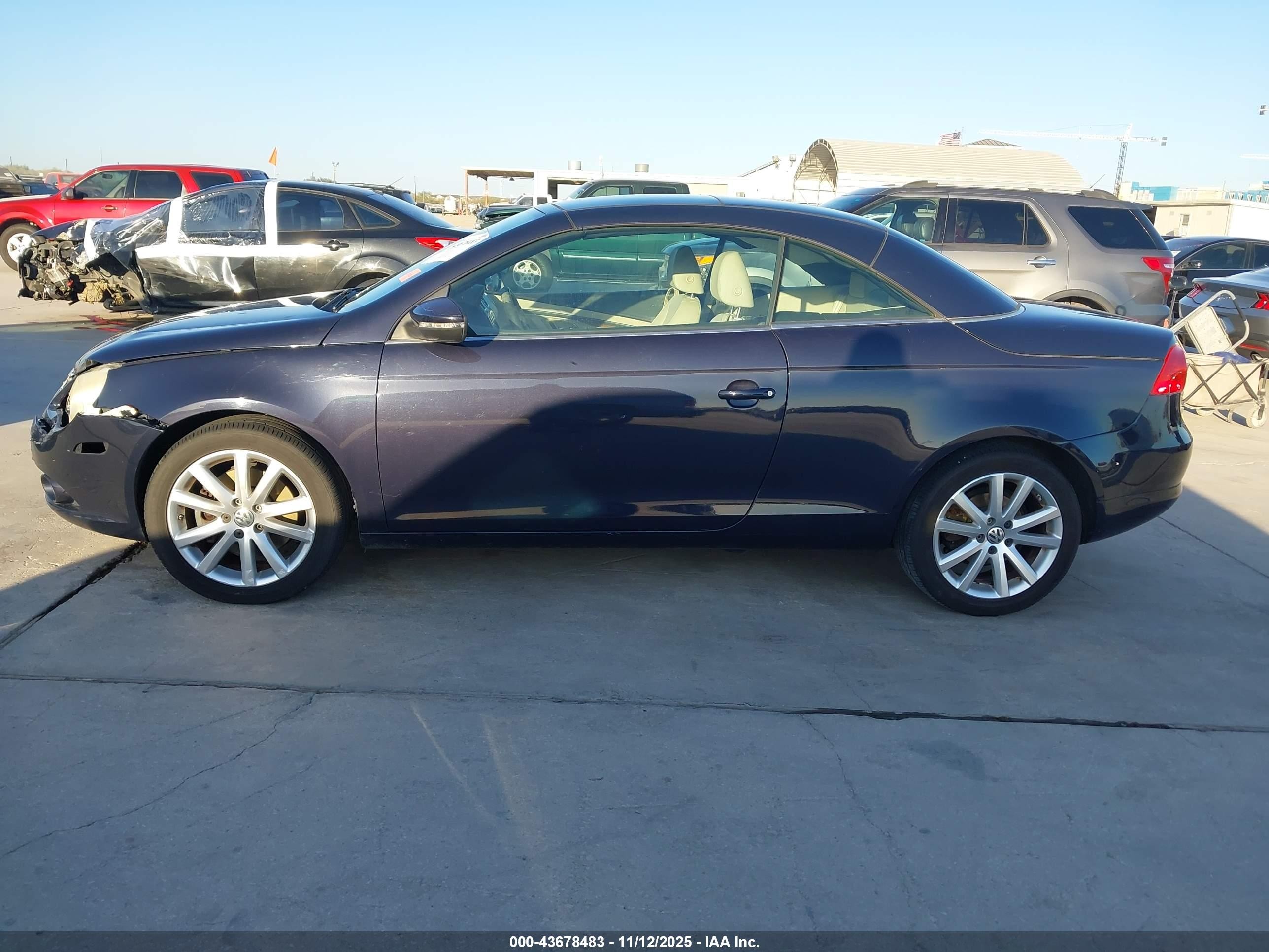 2011 Volkswagen Eos Komfort Синий vin: WVWBA7AH2BV001496