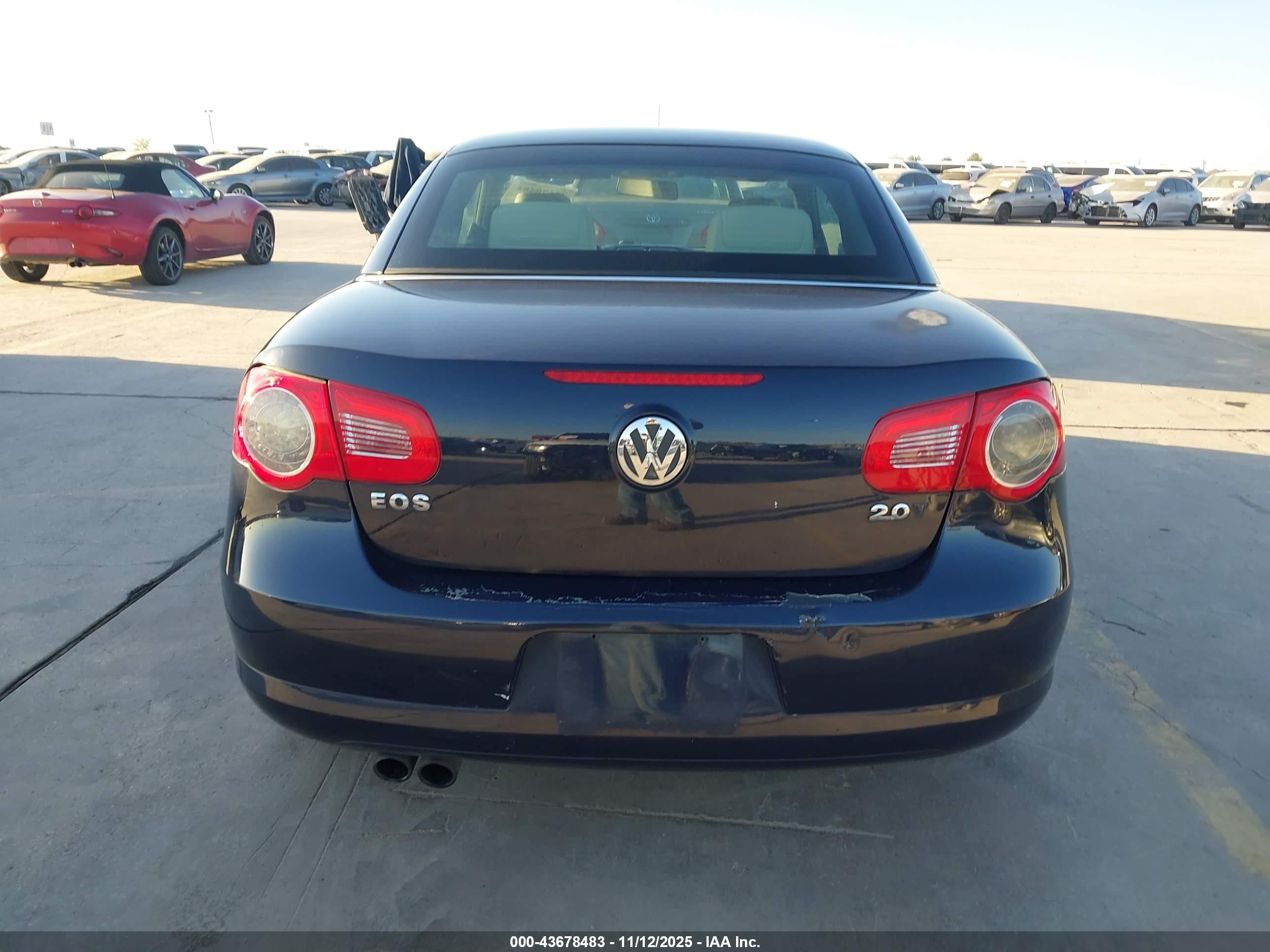 2011 Volkswagen Eos Komfort Синий vin: WVWBA7AH2BV001496