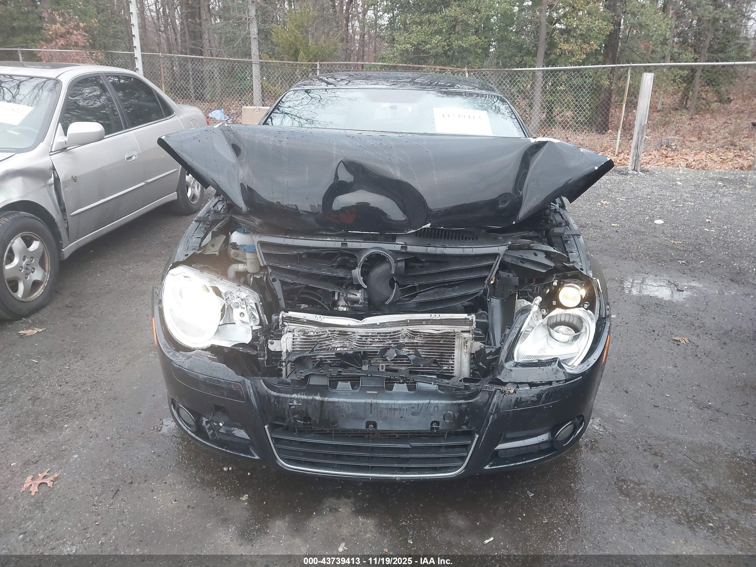2011 Volkswagen Eos Komfort Black vin: WVWBA7AH3BV001975