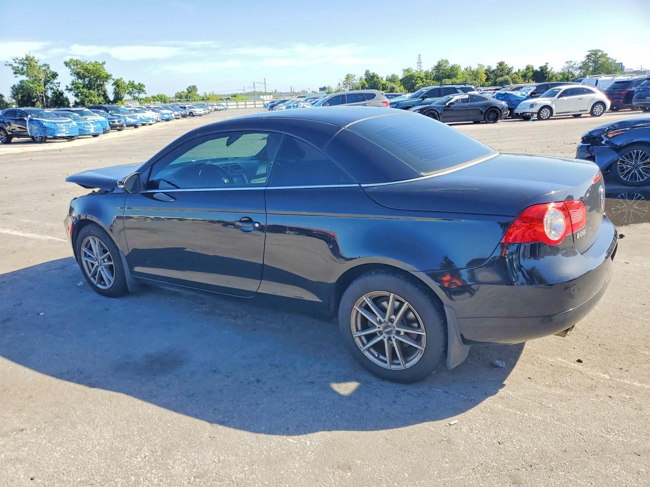 2010 Volkswagen Eos Turbo Black vin: WVWBA7AH7AV019331