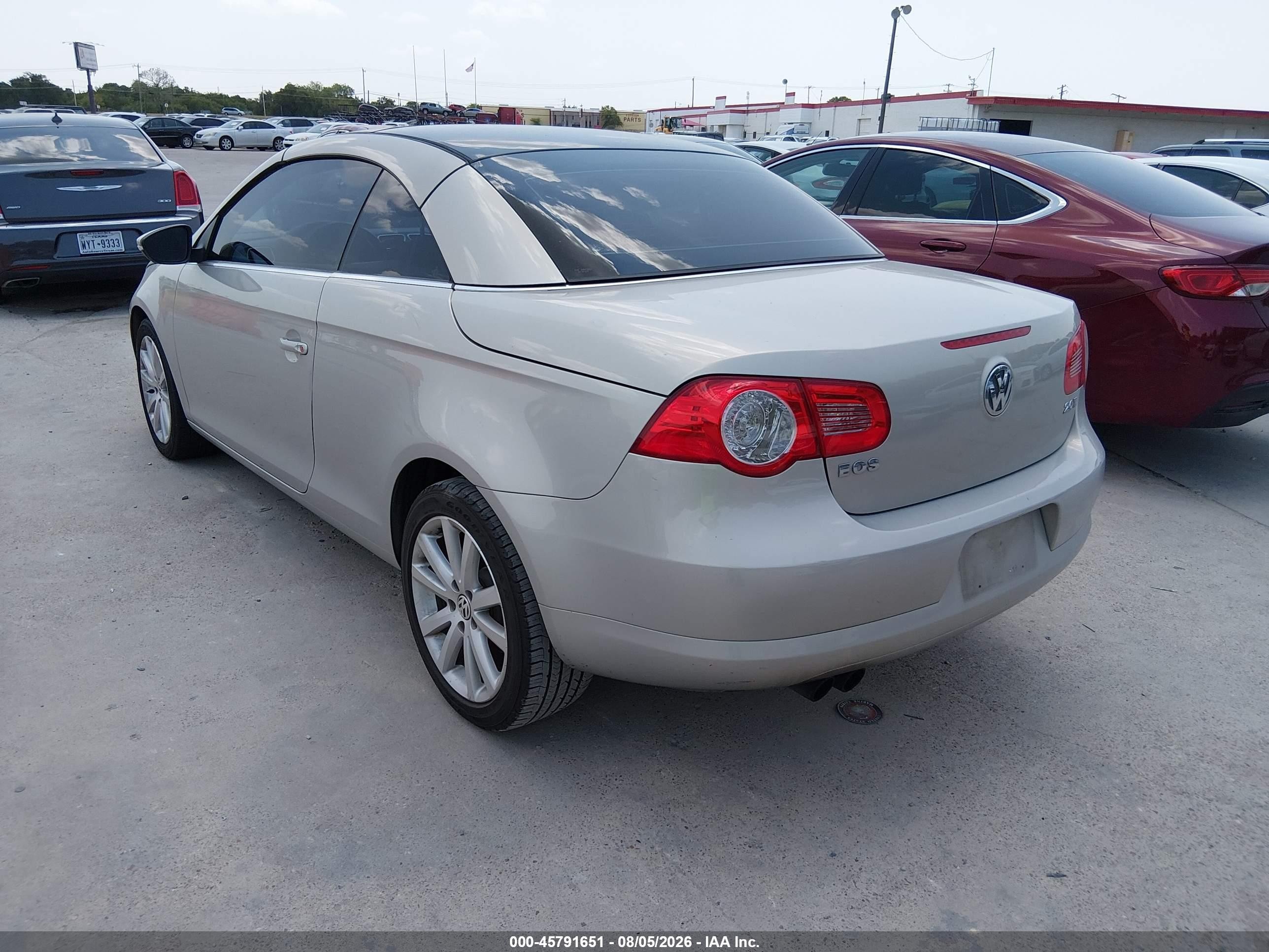 2010 Volkswagen Eos Komfort Gold vin: WVWBA7AH7AV021371