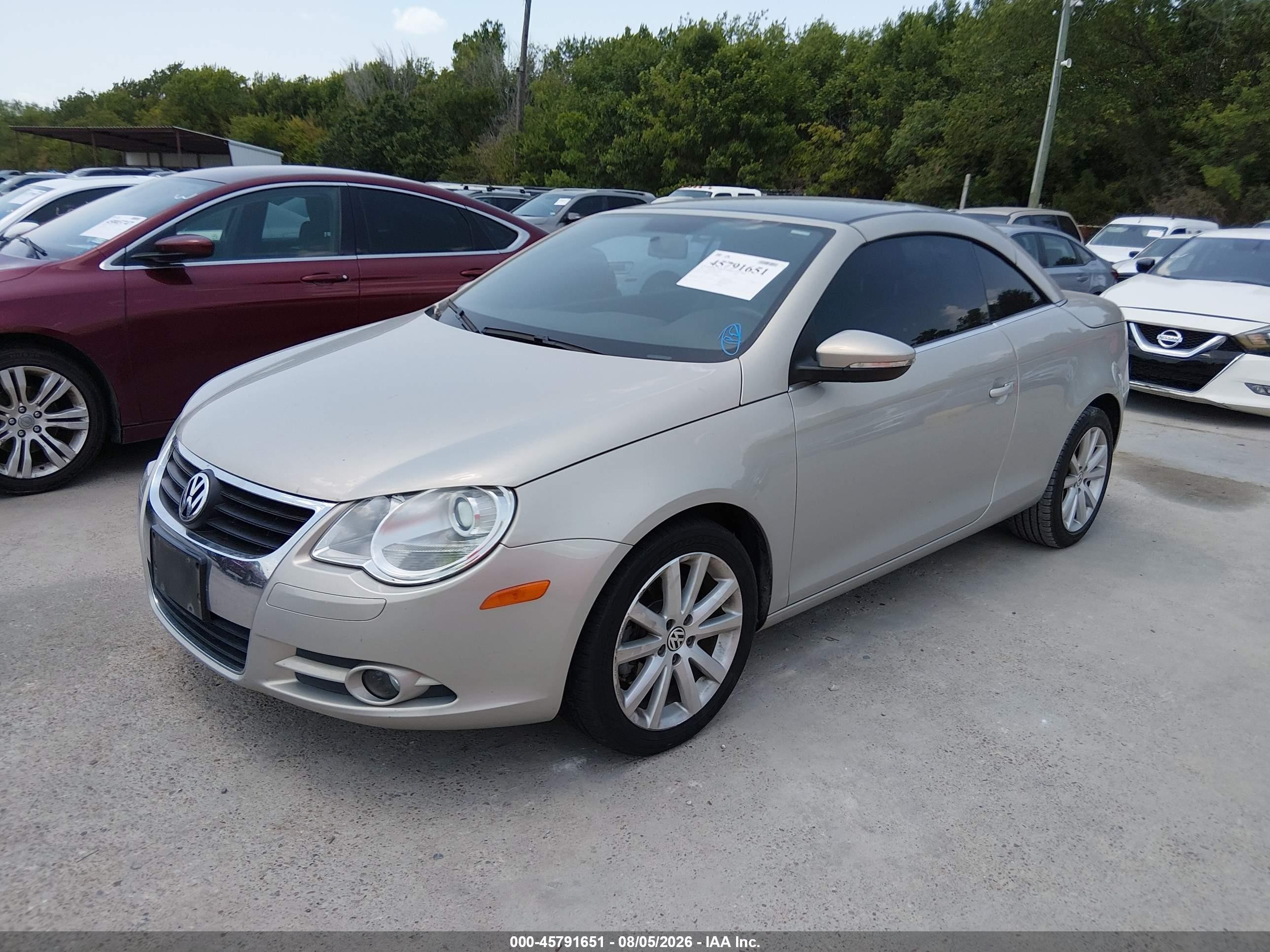 2010 Volkswagen Eos Komfort Gold vin: WVWBA7AH7AV021371