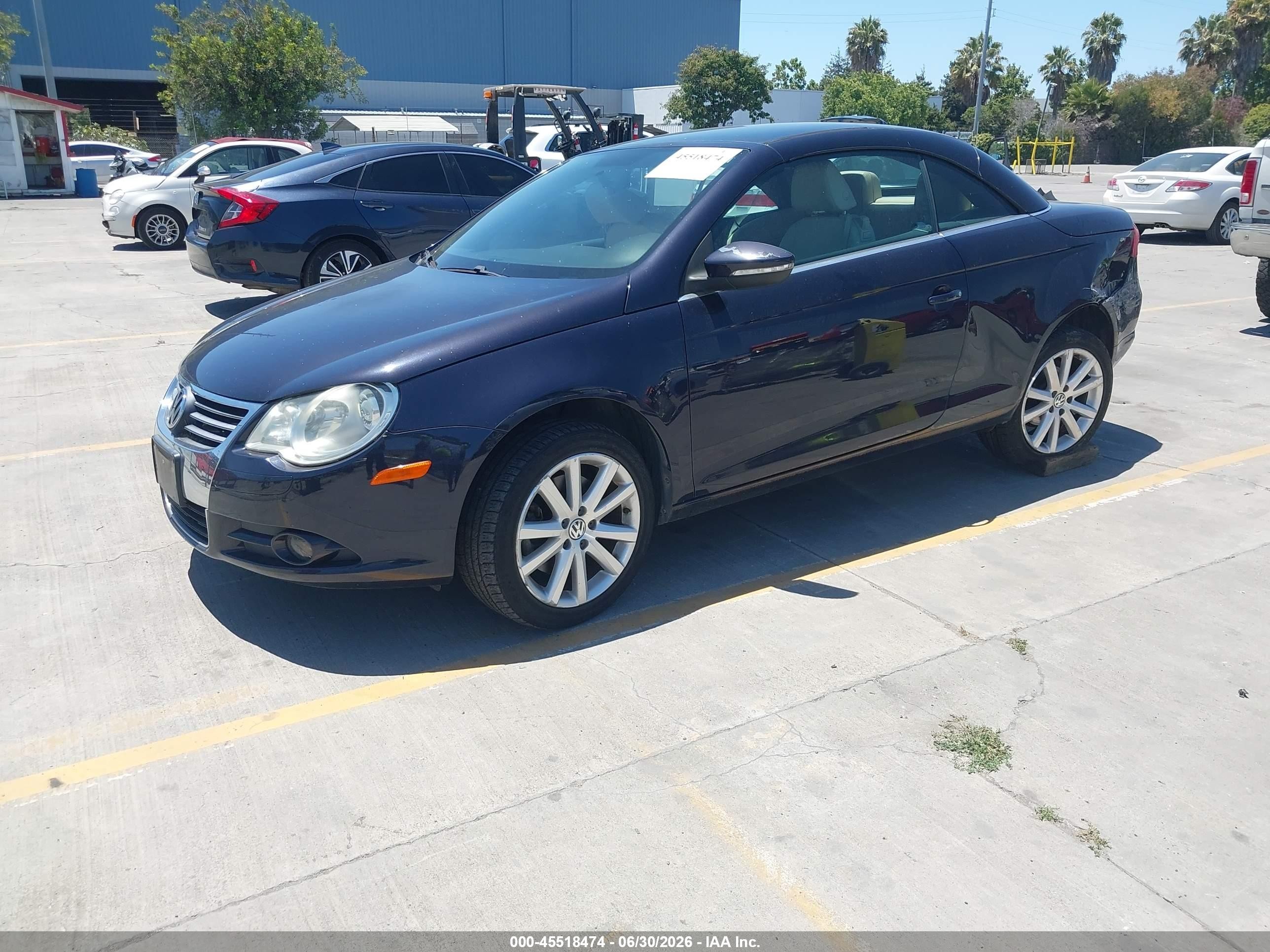 2010 Volkswagen Eos Komfort Black vin: WVWBA7AH7AV023900