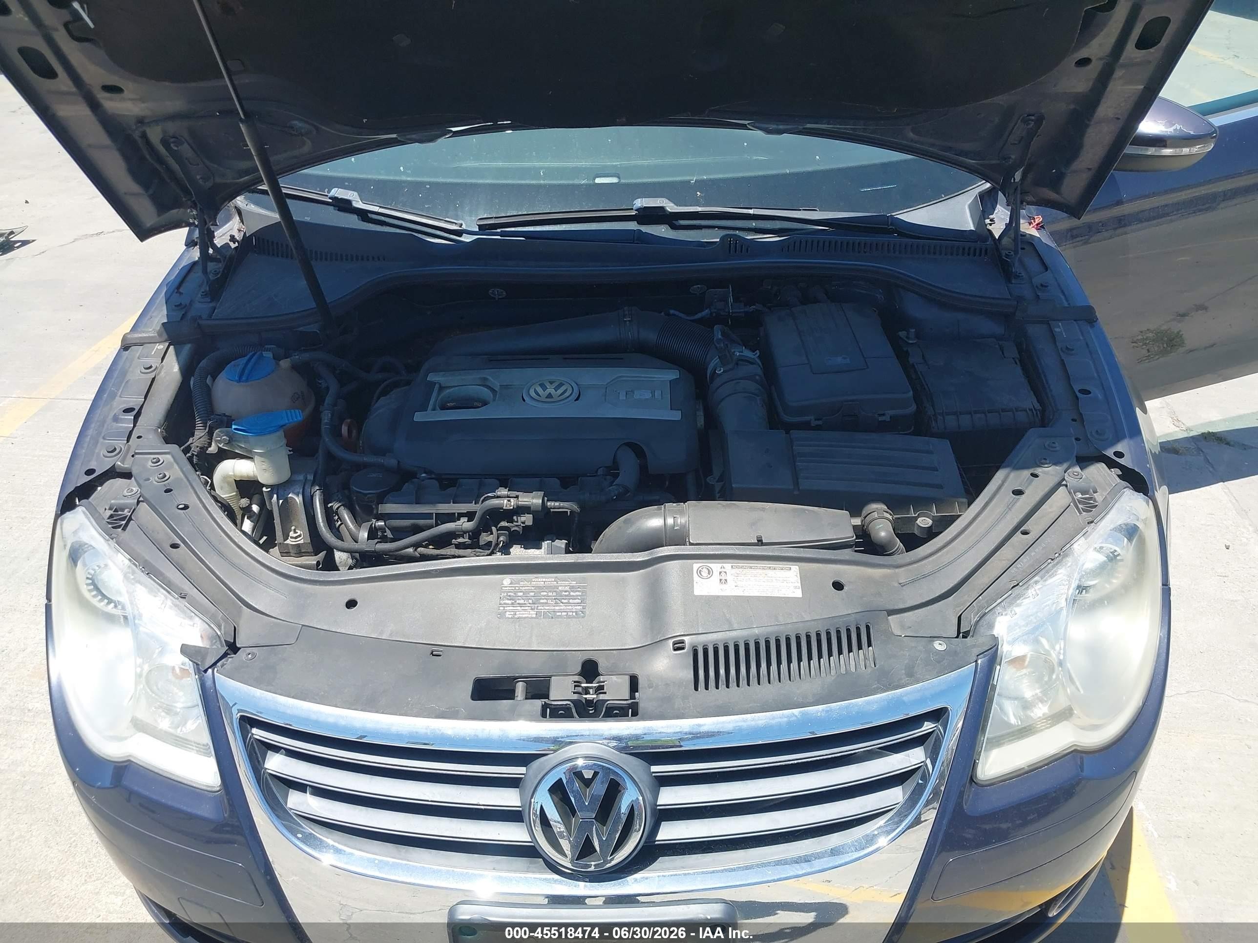 2010 Volkswagen Eos Komfort Black vin: WVWBA7AH7AV023900
