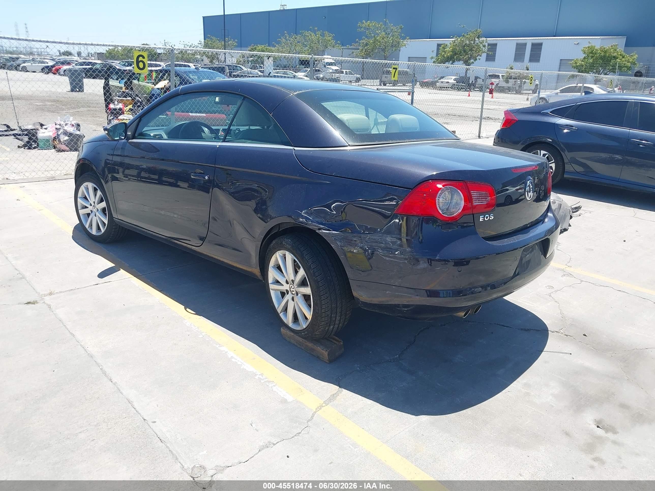 2010 Volkswagen Eos Komfort Black vin: WVWBA7AH7AV023900
