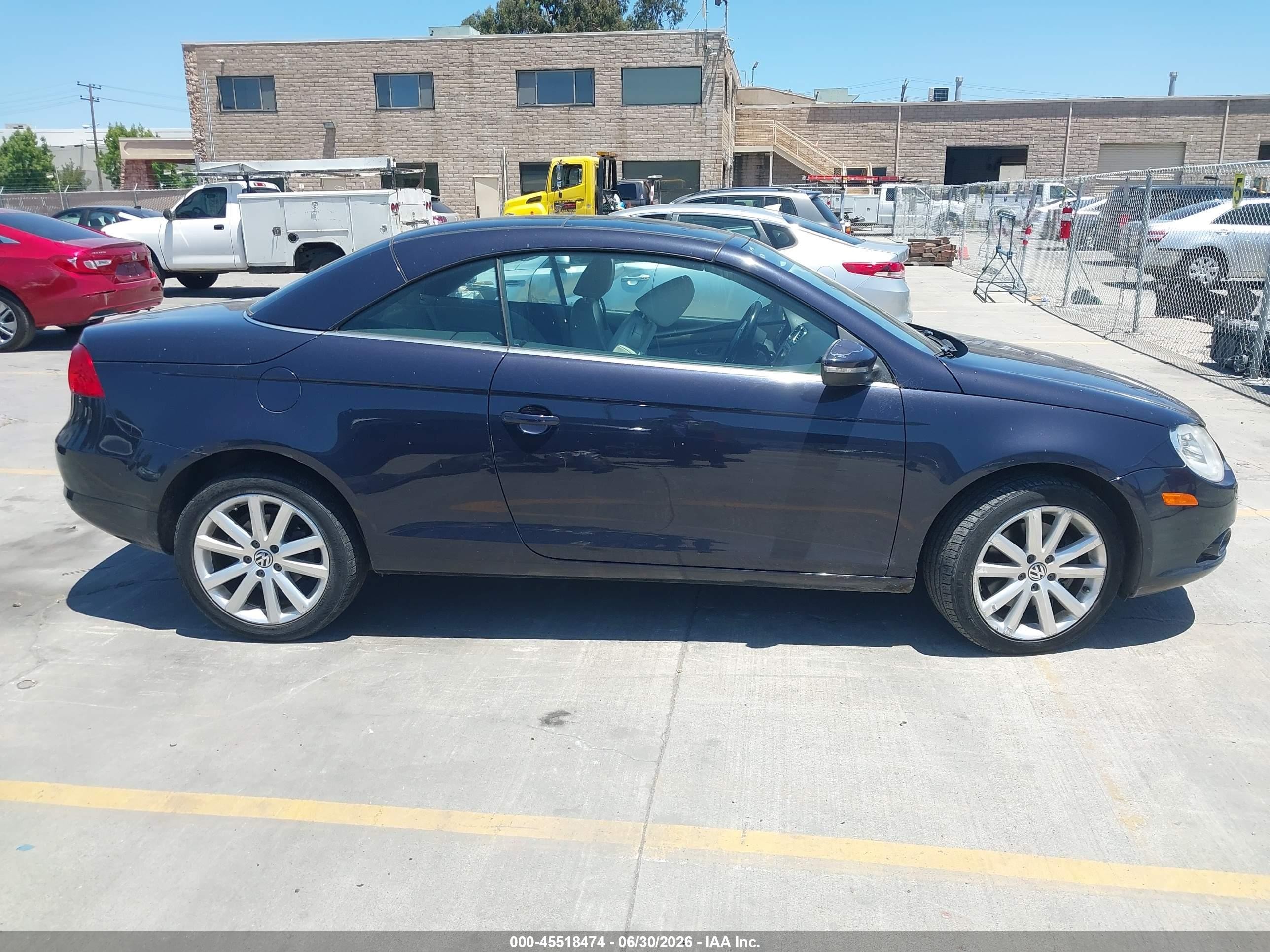 2010 Volkswagen Eos Komfort Black vin: WVWBA7AH7AV023900