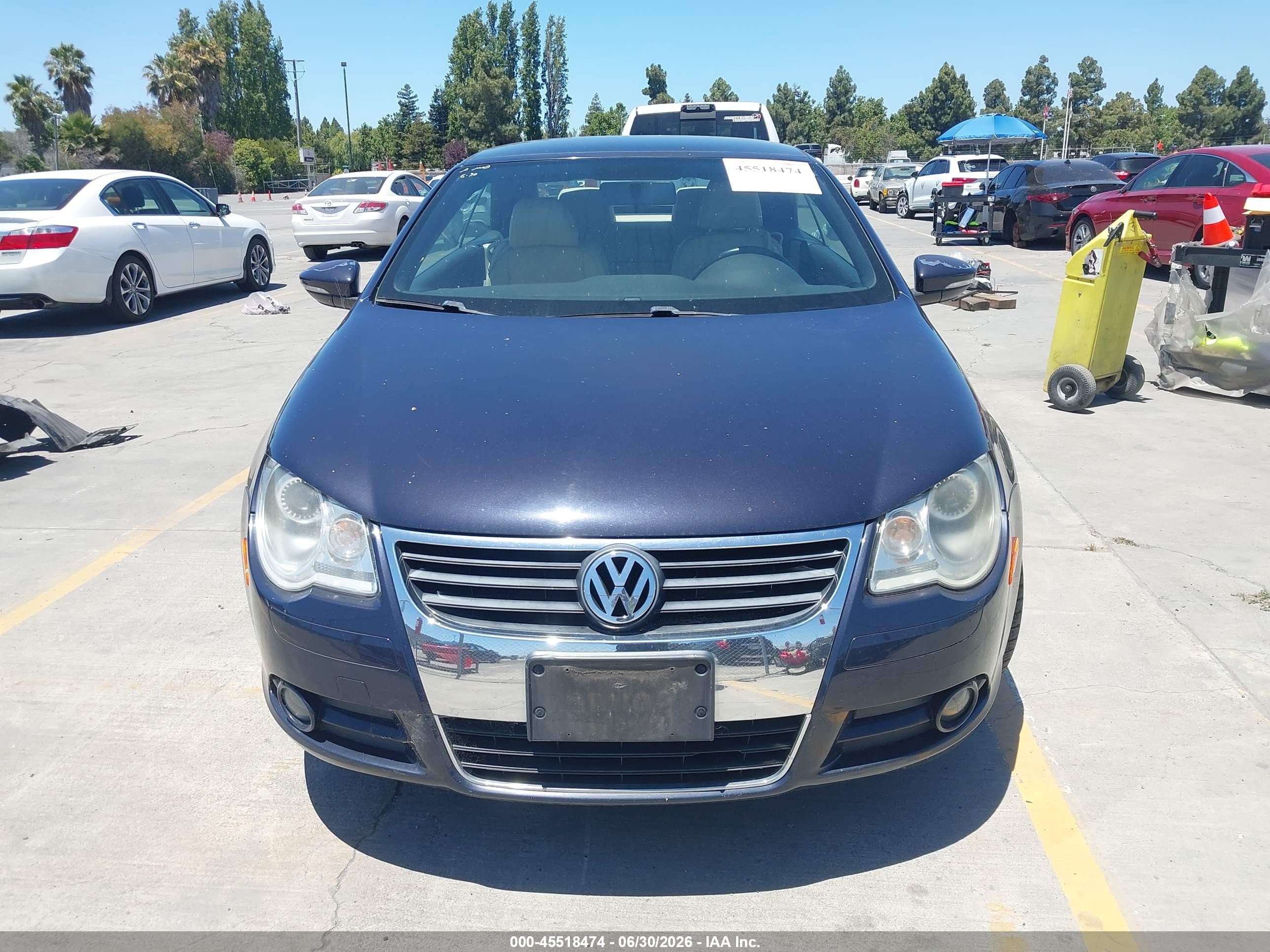 2010 Volkswagen Eos Komfort Black vin: WVWBA7AH7AV023900