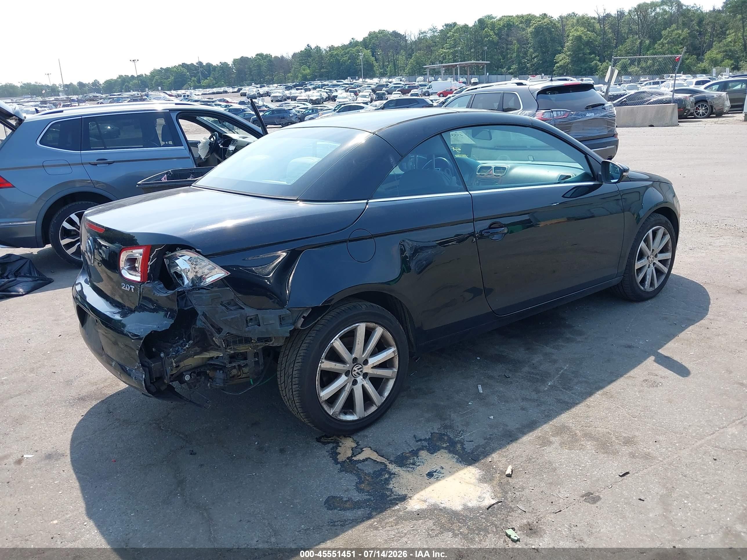 2010 Volkswagen Eos Komfort Black vin: WVWBA7AH8AV010105